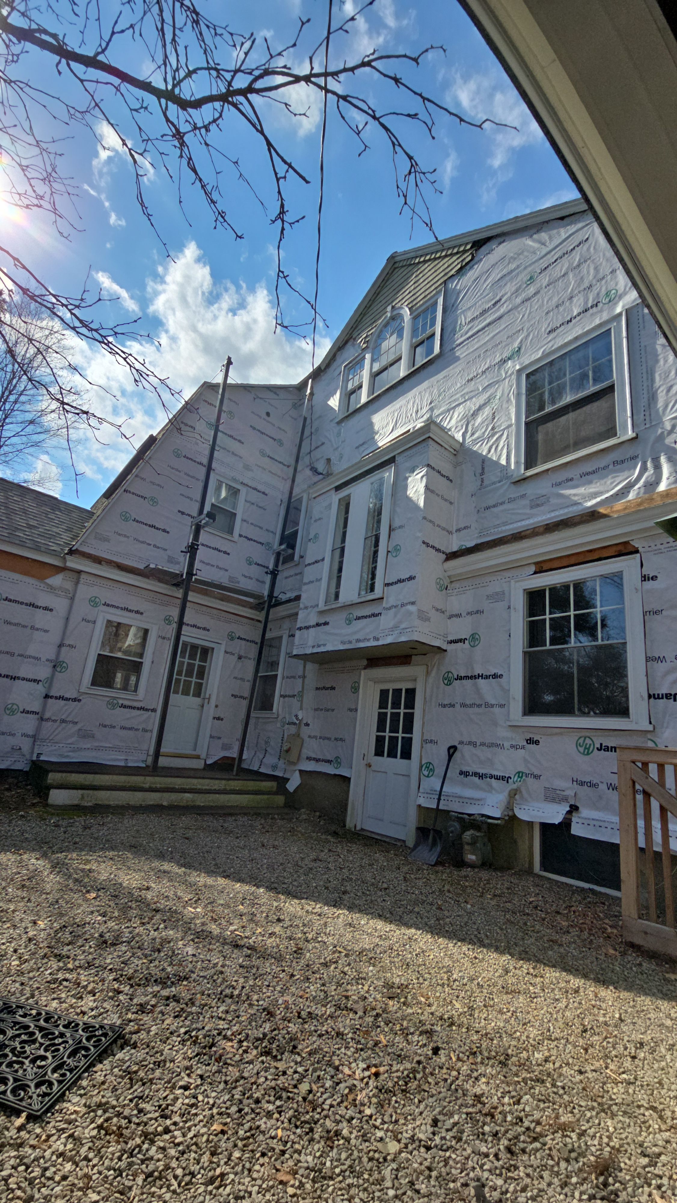 White cedar shingles and windows in Wayland, MA by UBrothers Construction
