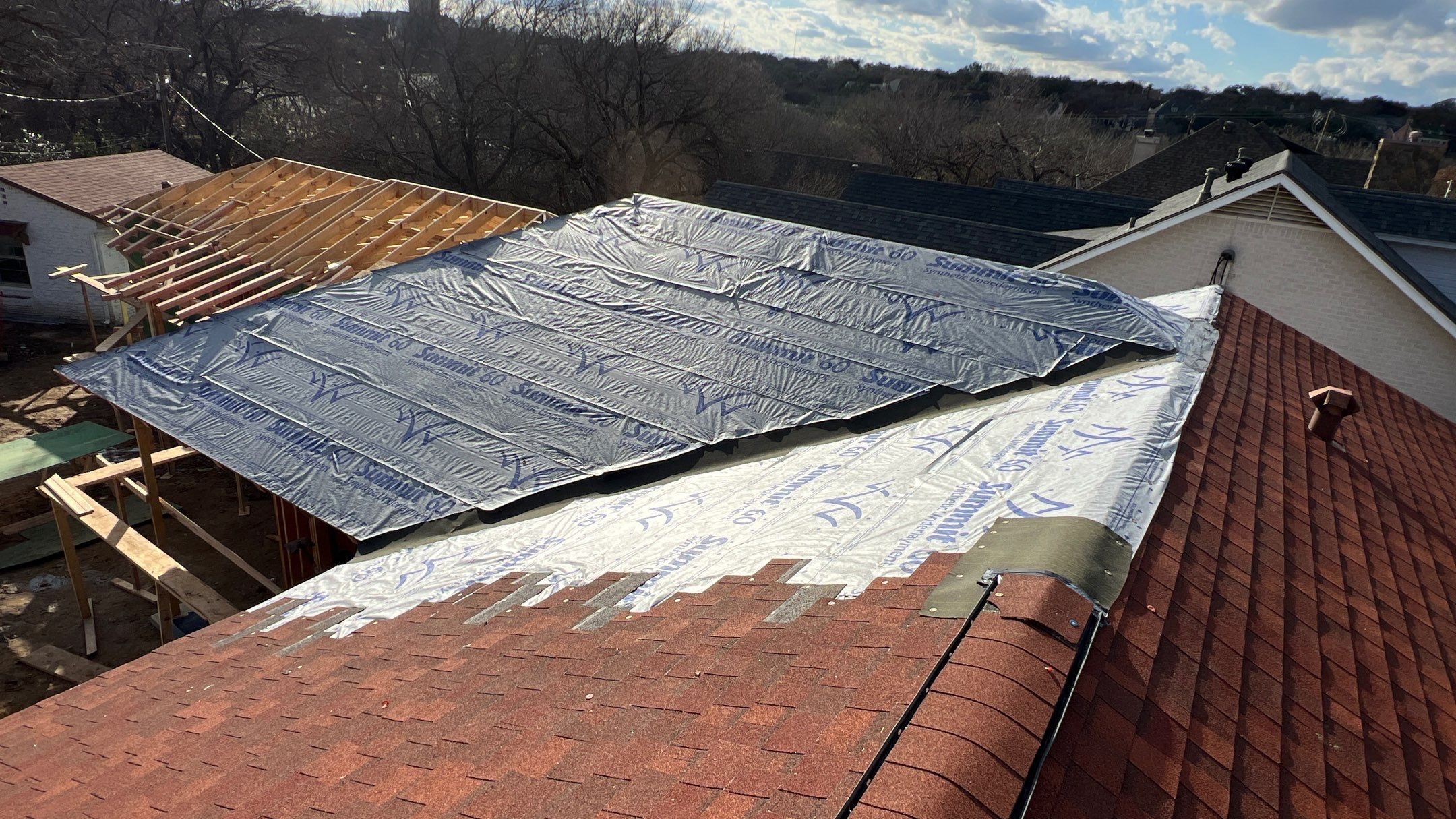 Residential Roofing Installation using Matching Roof Shingles by Harvey Roofing & Construction