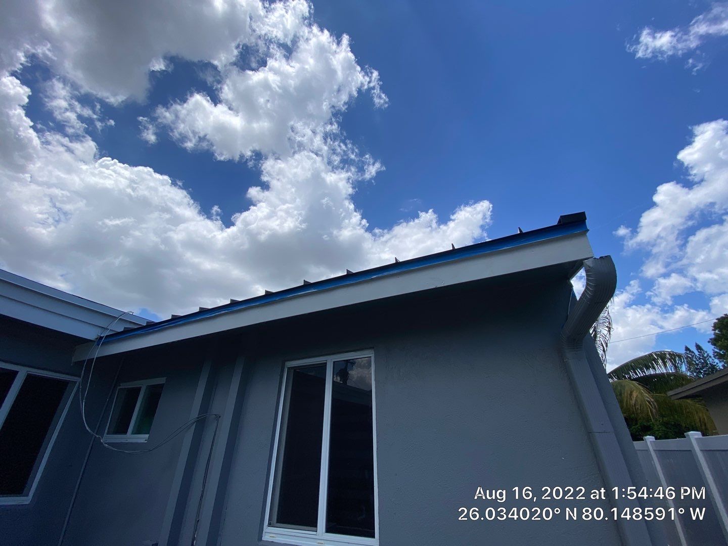 Standing Seam Metal & Flat Re-Roof using 1.5" Nail Strip 24ga Black Matte Kynar Coated Standing Seam Metal Panels by Morton Roofing, Inc.