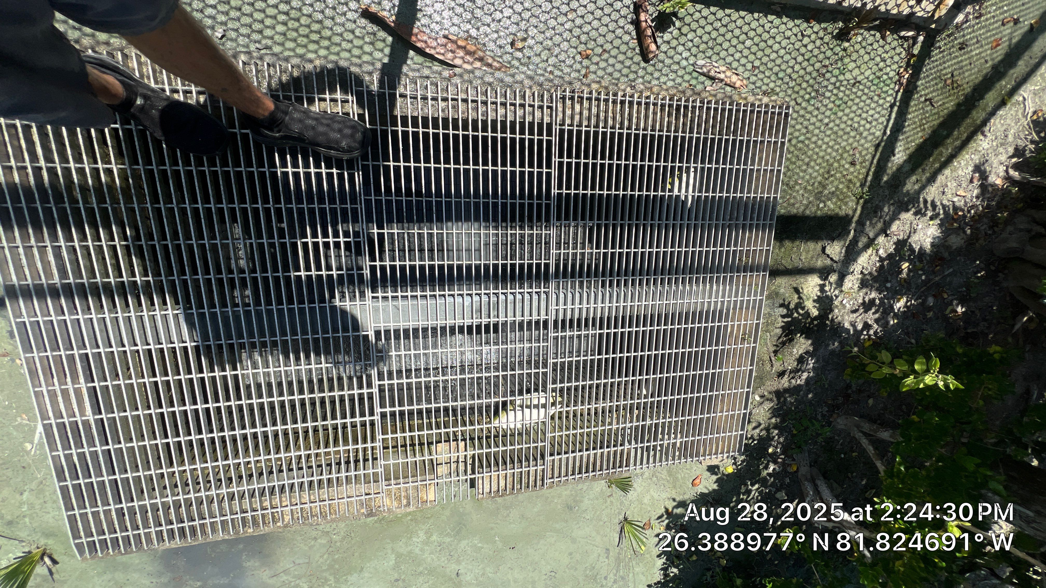 Pelican Landing Tennis Court Catch Basin Cleaning by APS Power & Water