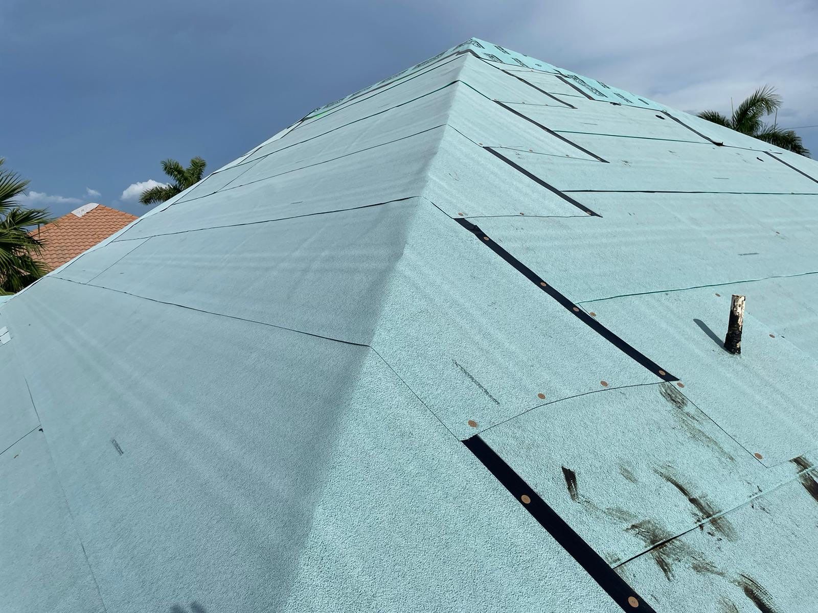 SW Cape Coral Stone Coated Steel Roof Installation by Four Peaks Roofing