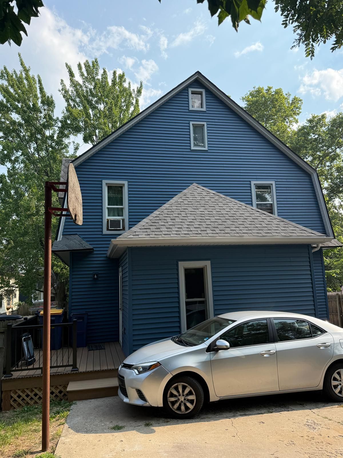 SIDING, DECK AND NEW PORCH  by Avalon Roofing and Exteriors