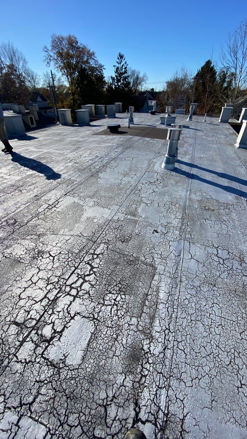 Silicone Coating system on residential complex by Roof Plus