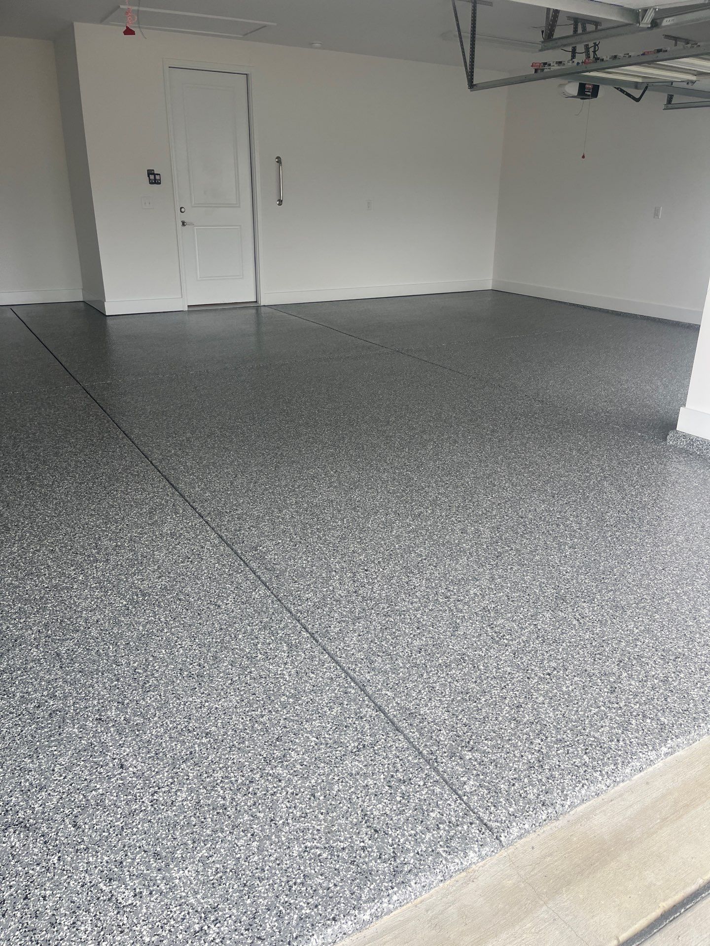Garage Floor Coating using Wombat by My Garage Floor Guys