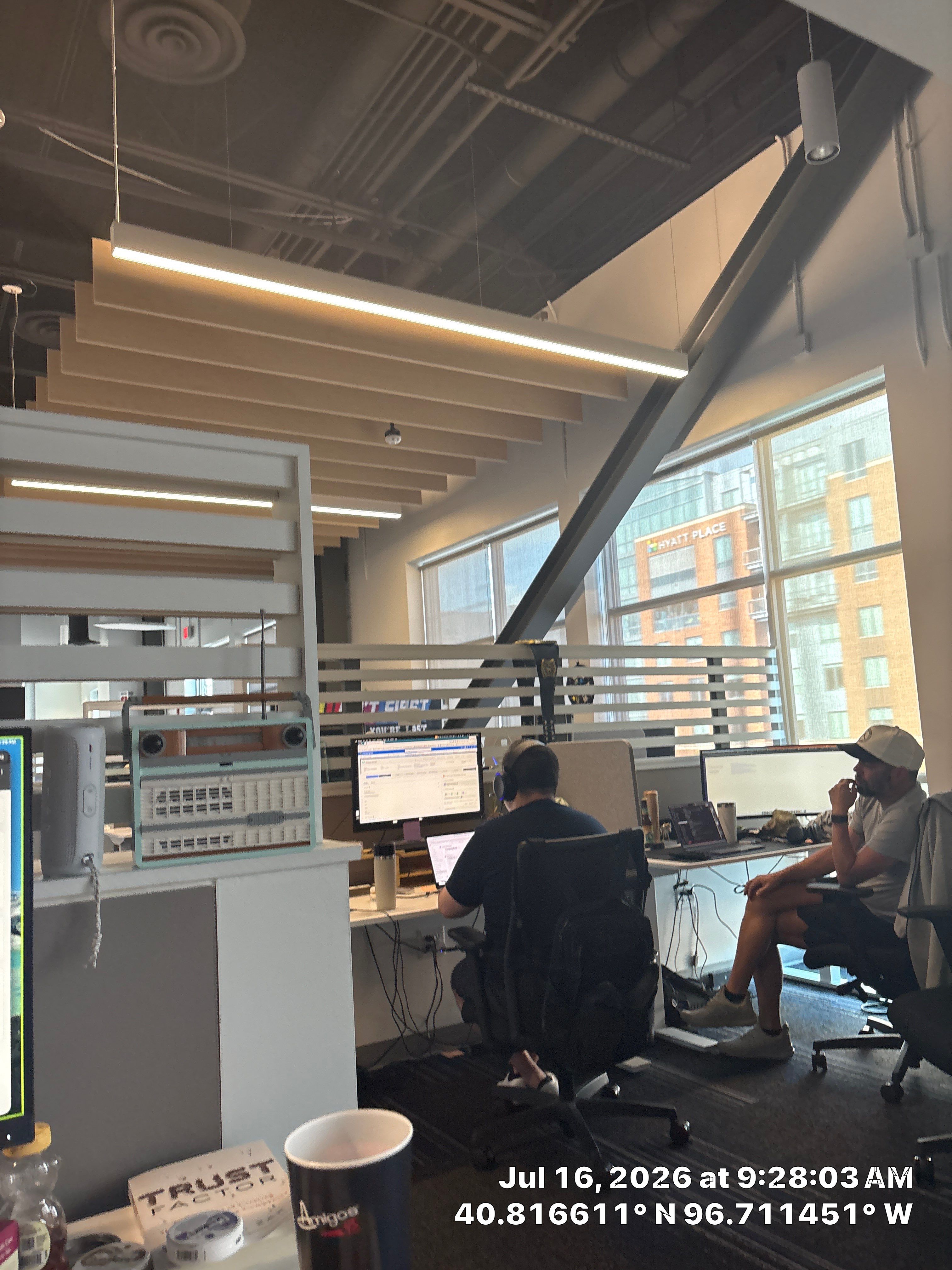 Modern Office Interior Renovation and Acoustic Baffles in Lincoln by CompanyCam Sales Demo