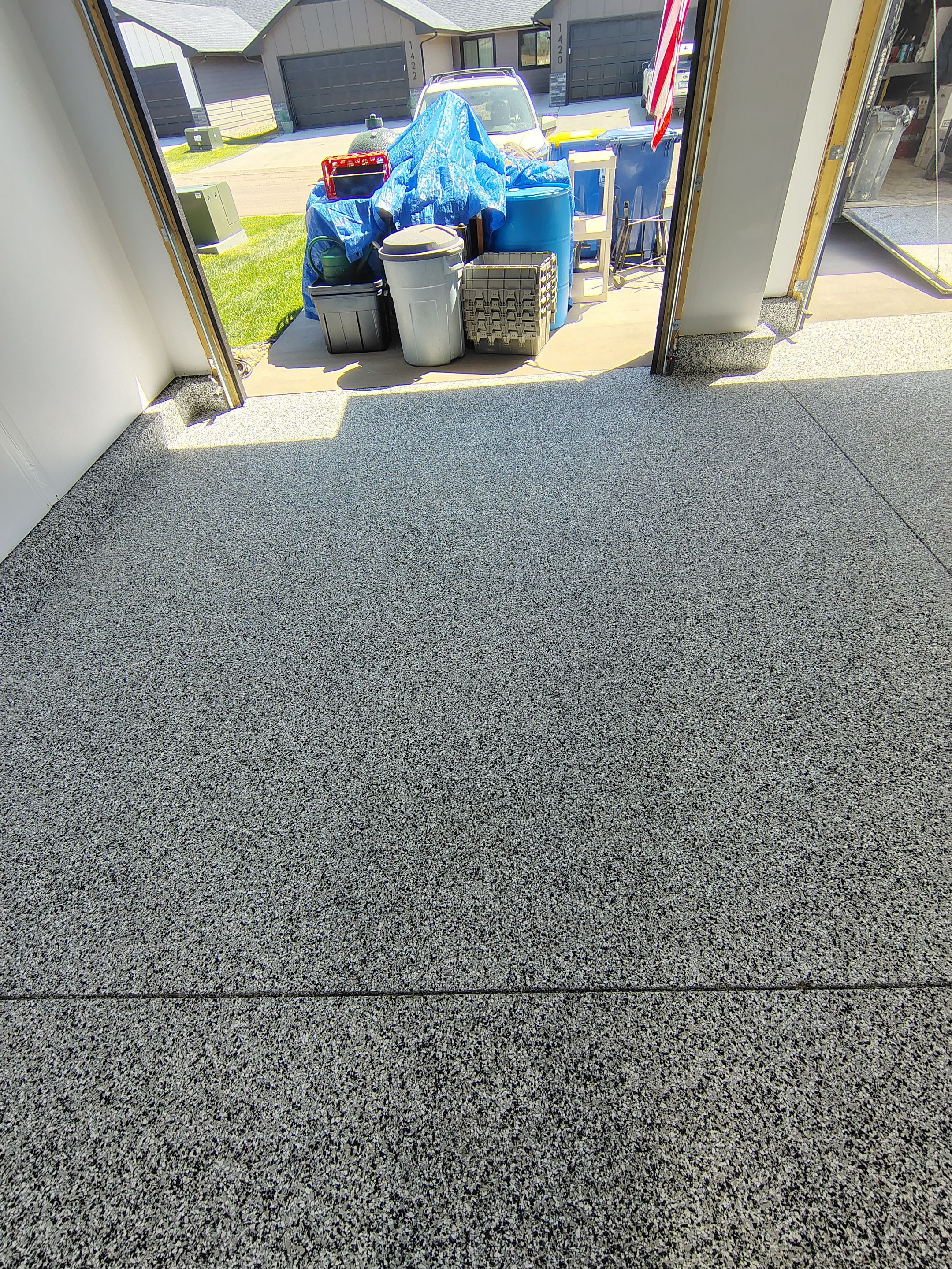 Decorative Flake Garage Floor Coating Installation in Tea, South Dakota by Select Painting, Coatings & Garage Cabinets