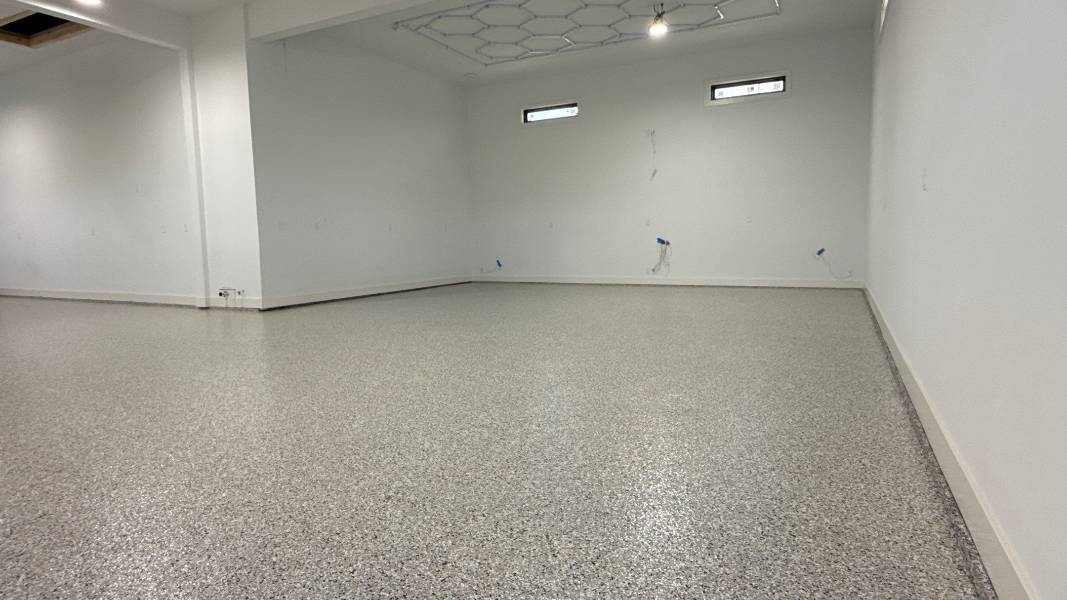 Chris Made The Great Choice Of Cabin Fever Flake Floor by Banner Garage