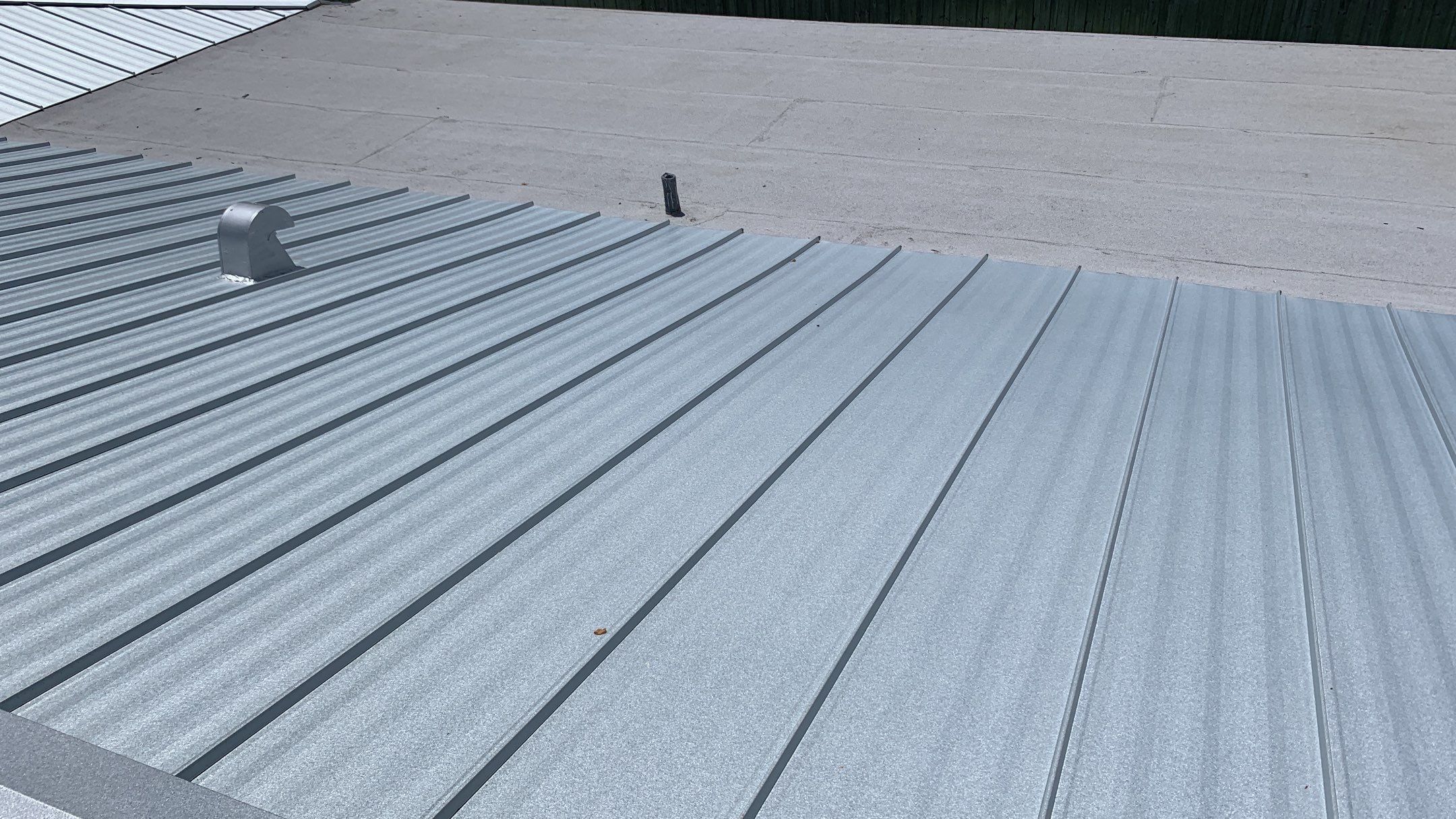 Residential Roofing Installation using 1" Nail strip metal roof by BLUES BROTHERS ROOFING
