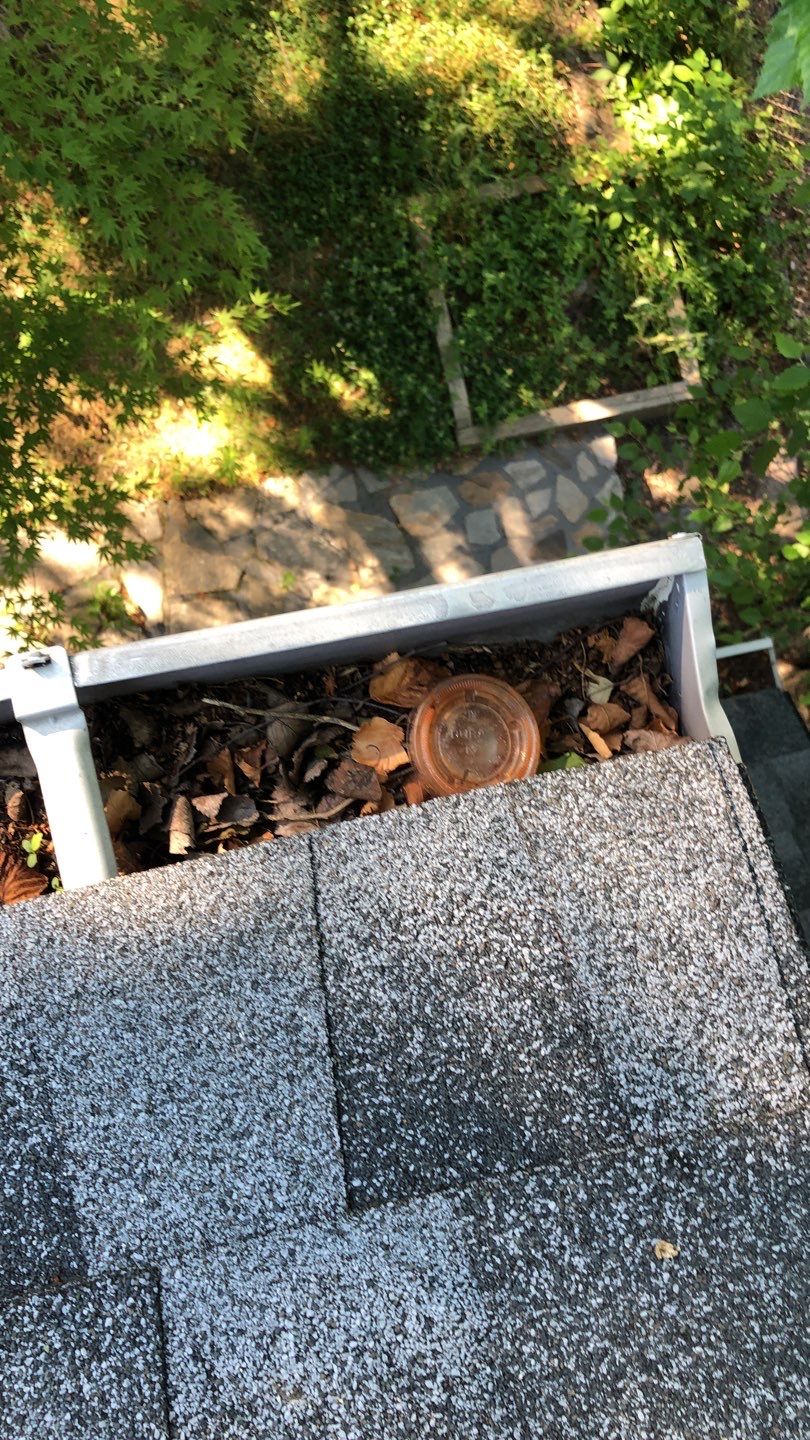 Gutter Cleaning by American Home Contractors