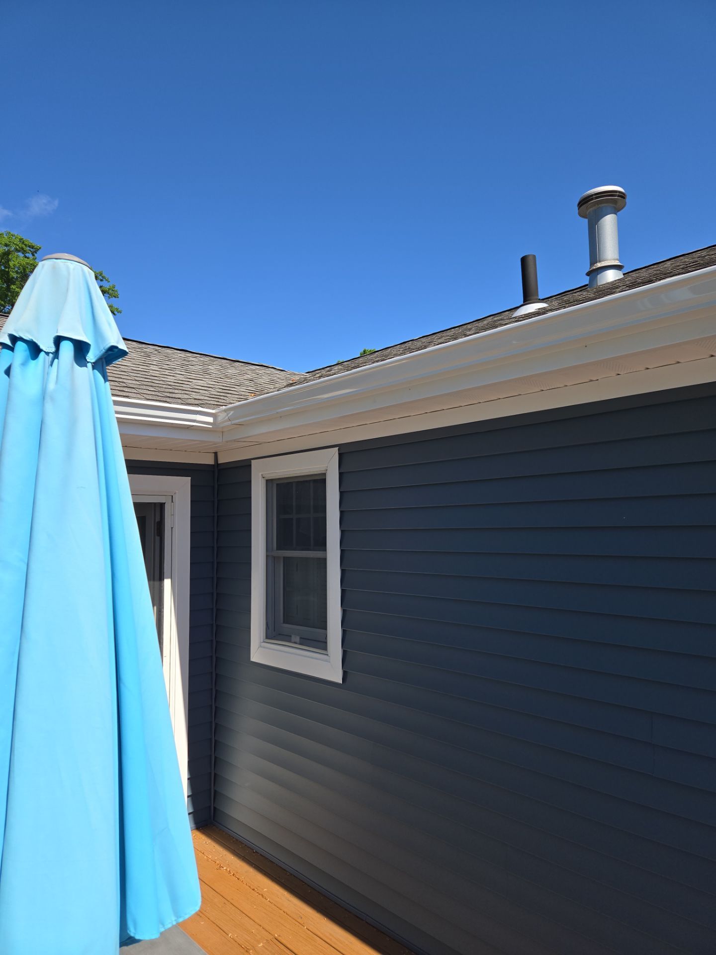 Siding Installation using Certainteed Cedar Impressions Straight Edge Perfection Shingles - D7 - Pacific Blue by A Plus Exterior