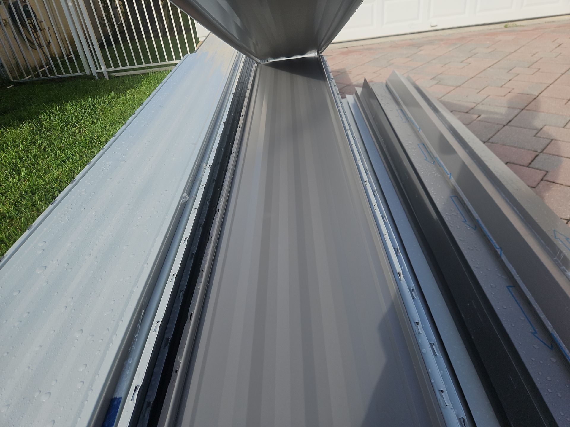 Residential Roofing Installation using 1" Nail strip metal roof by BLUES BROTHERS ROOFING