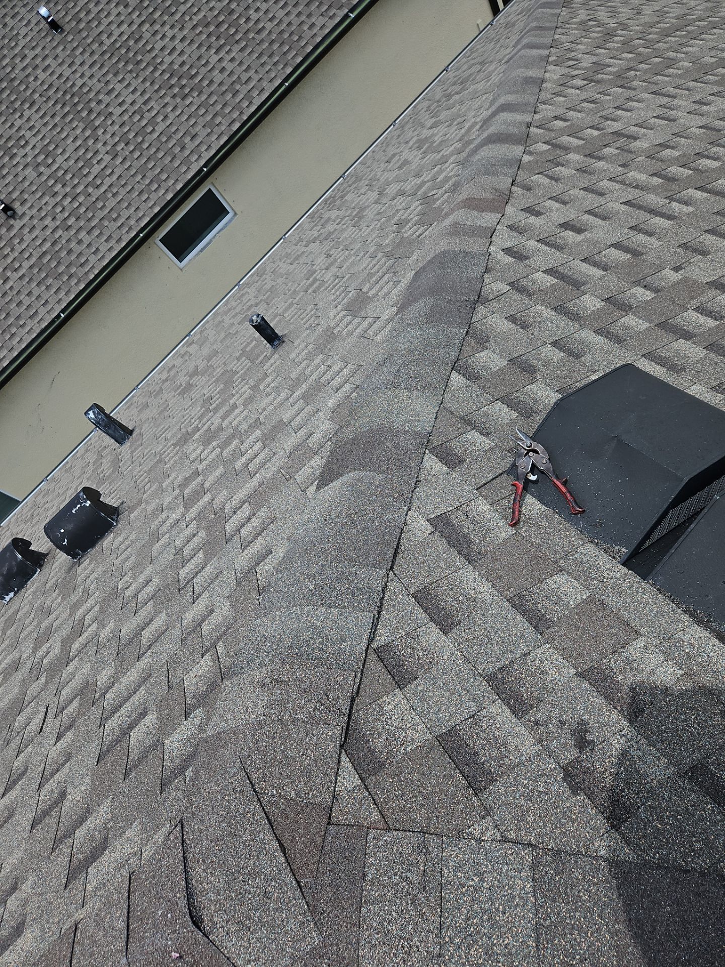 K-Style Seamless Gutter Installation using bronze gutters in Sarasota FL by Gutter Professors