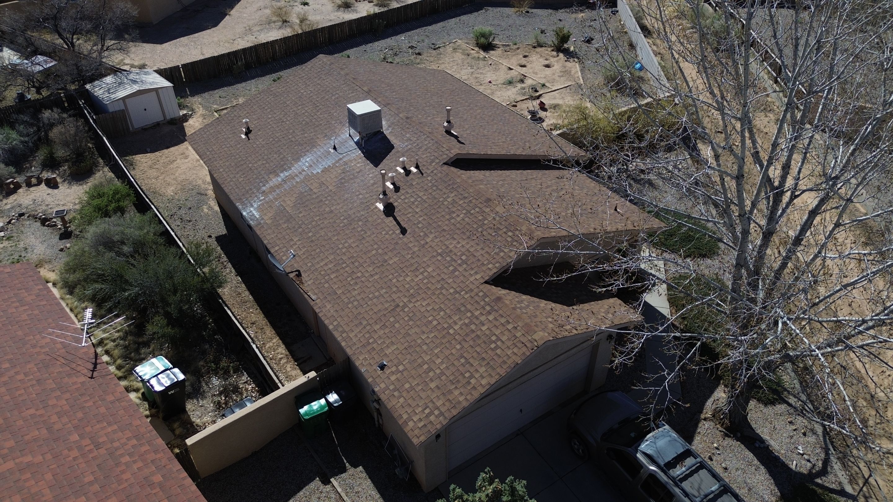 Oakridge Desert tan shingles in Chimayo Meadows by Doyle Roof Masters Inc