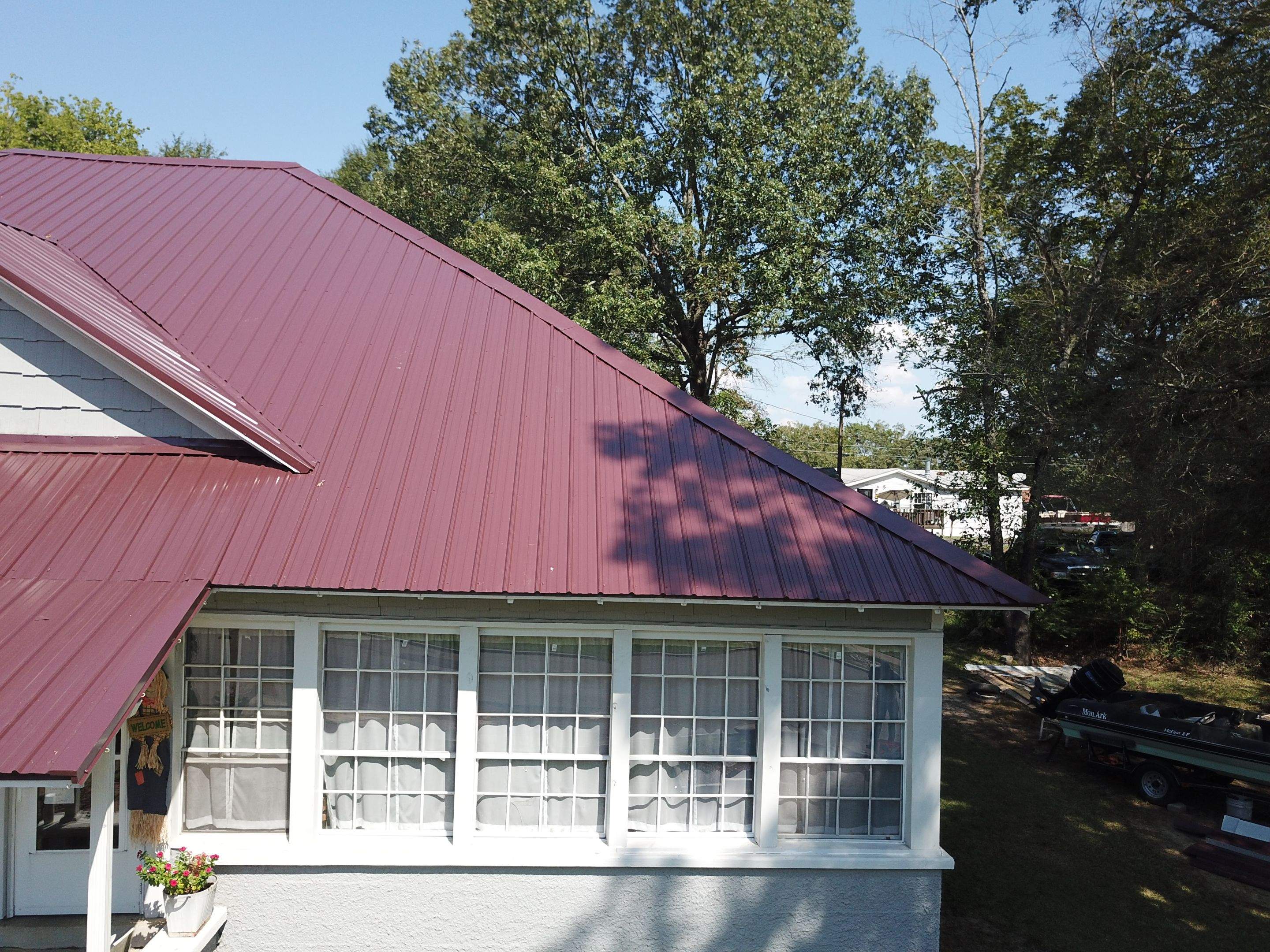 Residential Metal Roof Replacement using Reed's Metals: Colored Residental Panel (Burgundy) by Hostetler Roofing