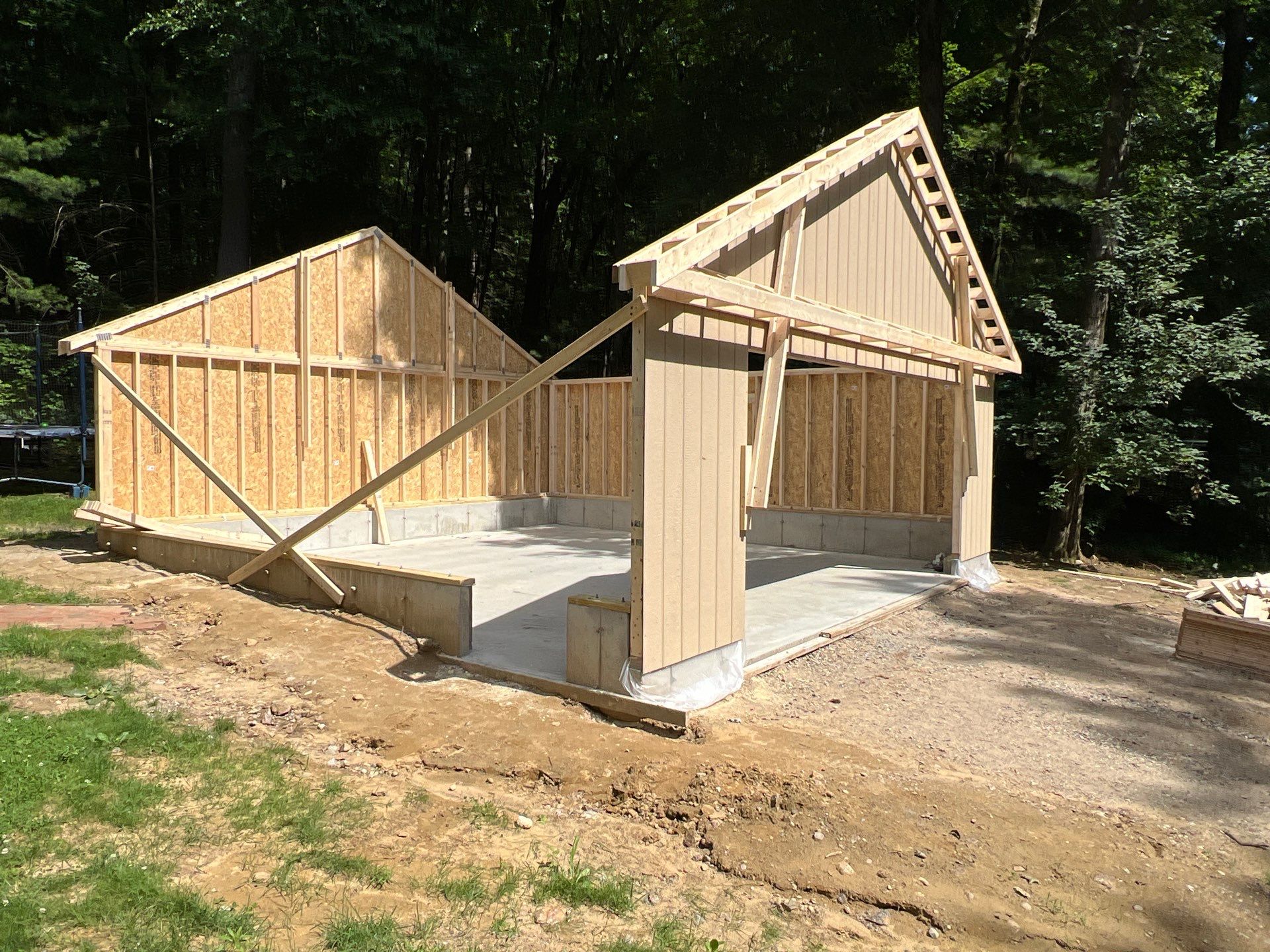 Garage using LP SmartSide Panel Siding by Chagnon Building & Remodeling LLC