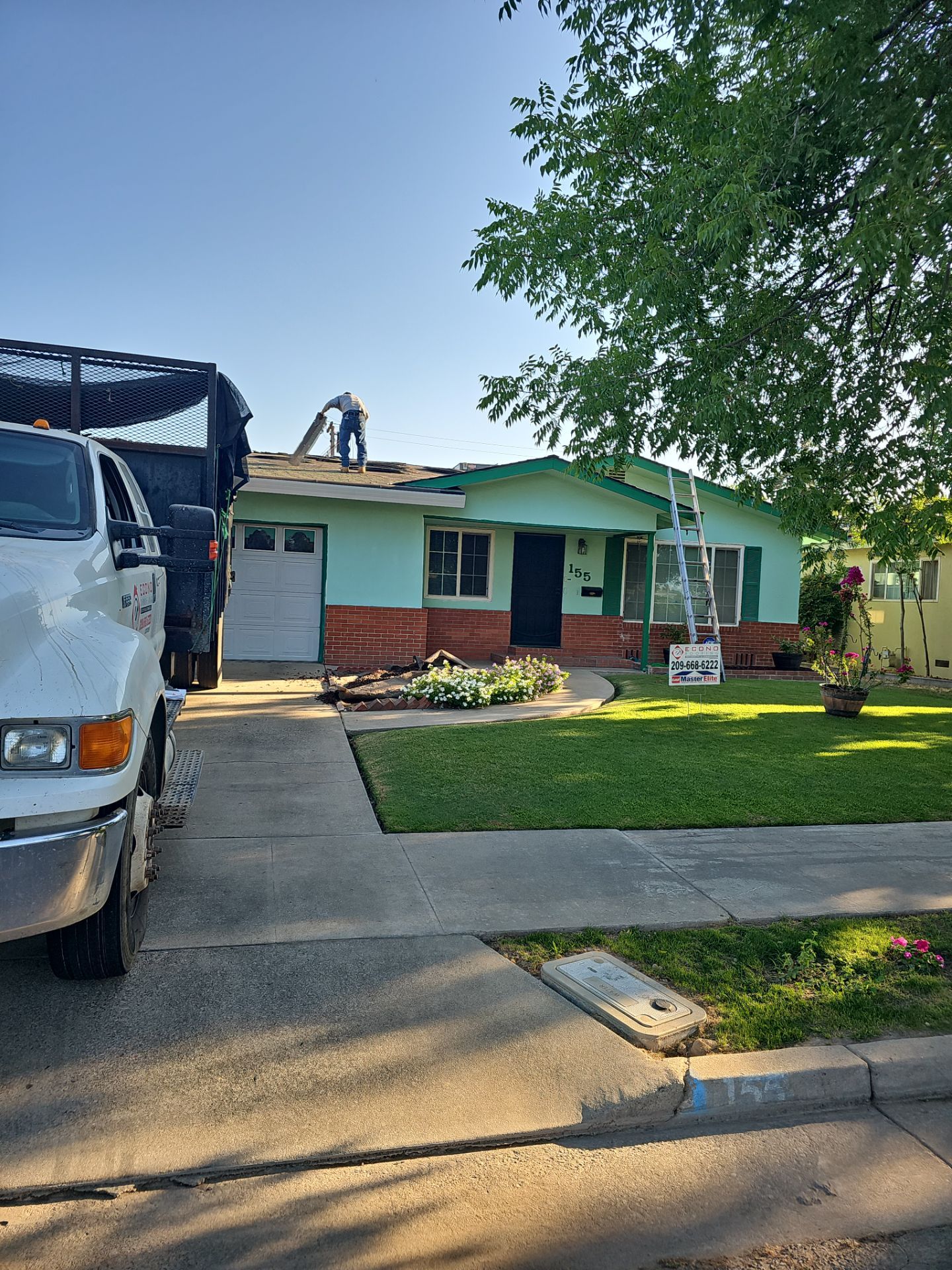 Osborn Terrace Atwater  by Econo Roofing