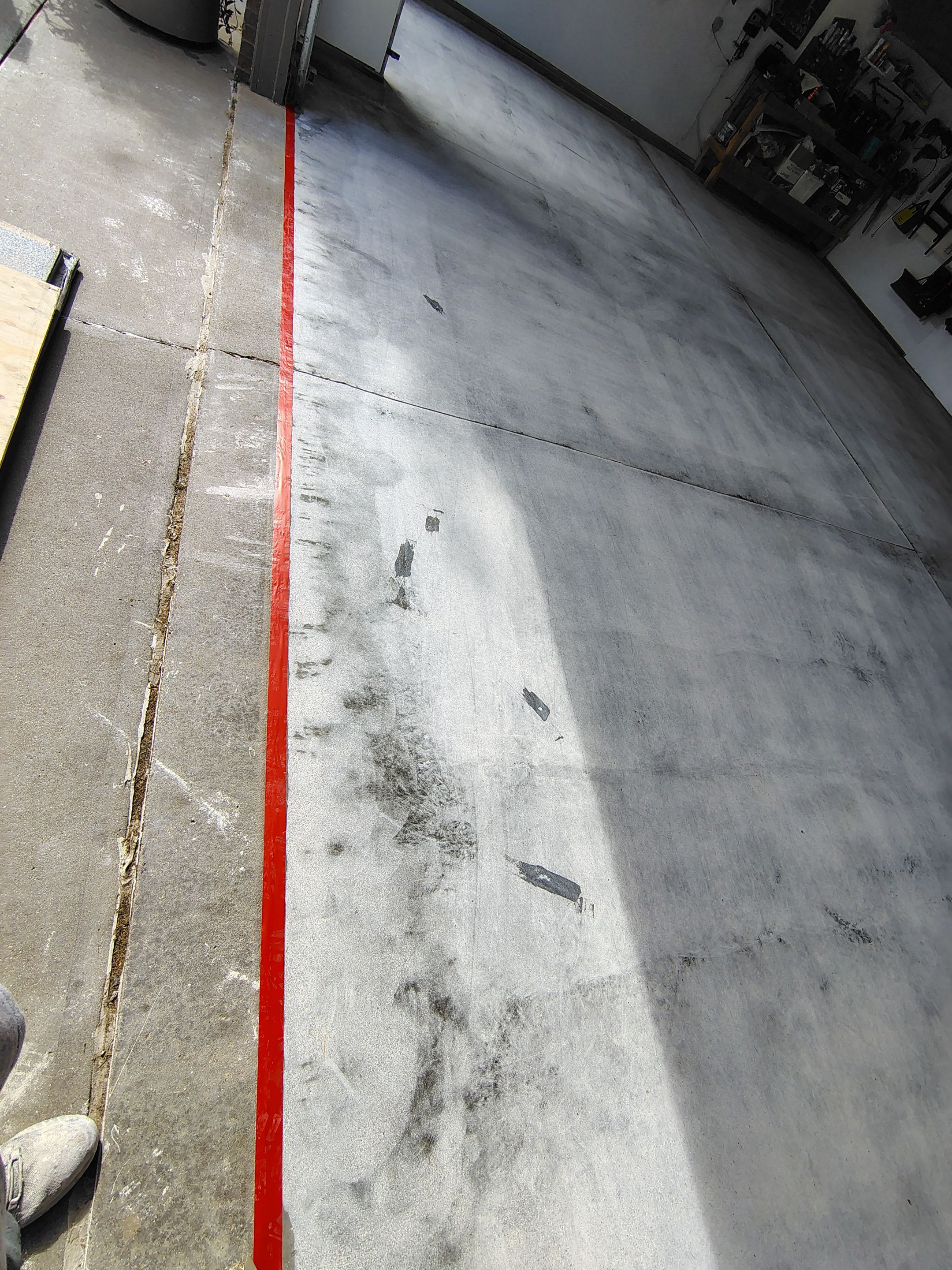 Durable Garage Floor Coating in Brandon by Select Painting, Coatings & Garage Cabinets