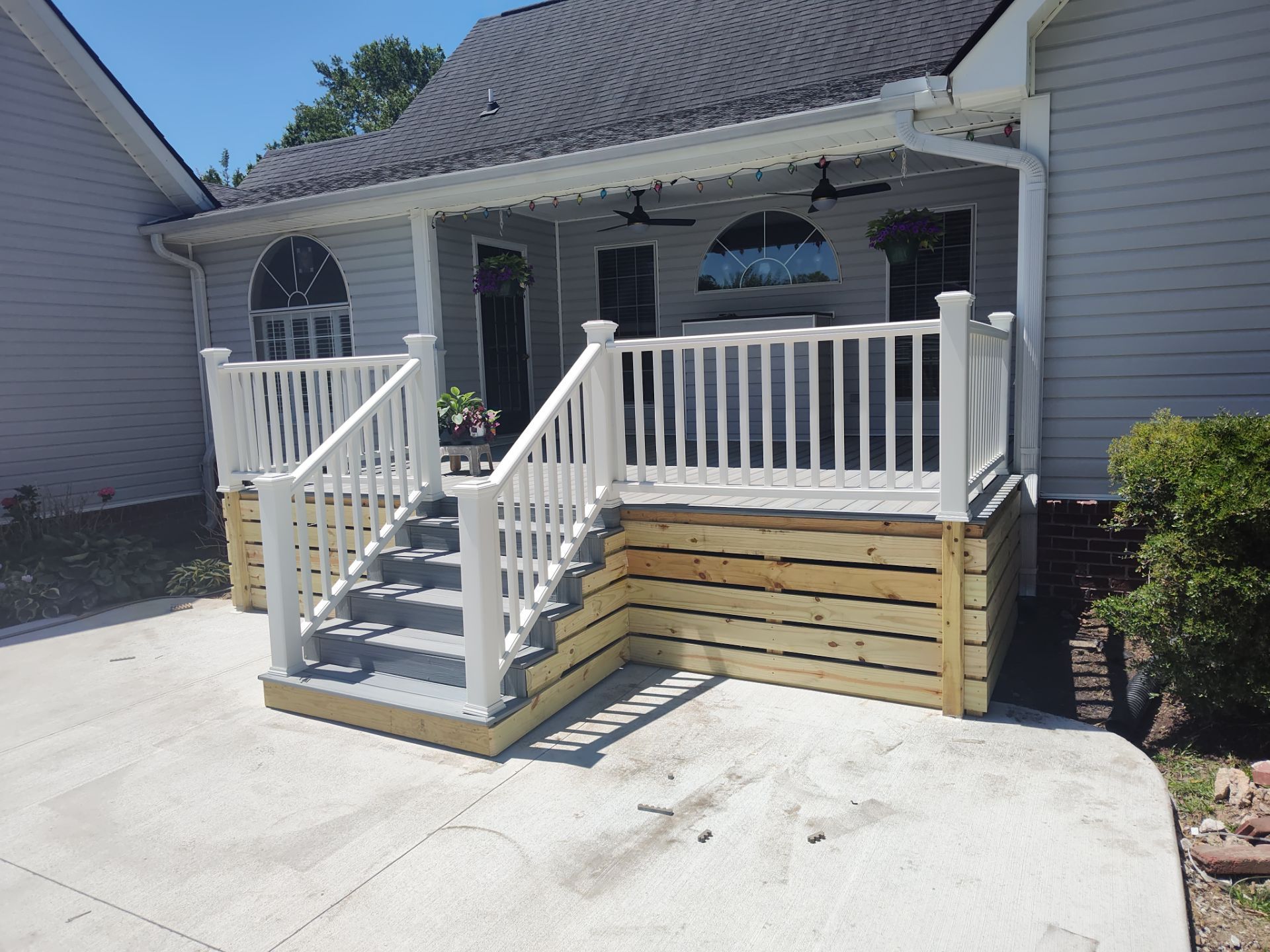 Outside porch and concreate work by Cornerstone Home Builders, LLC