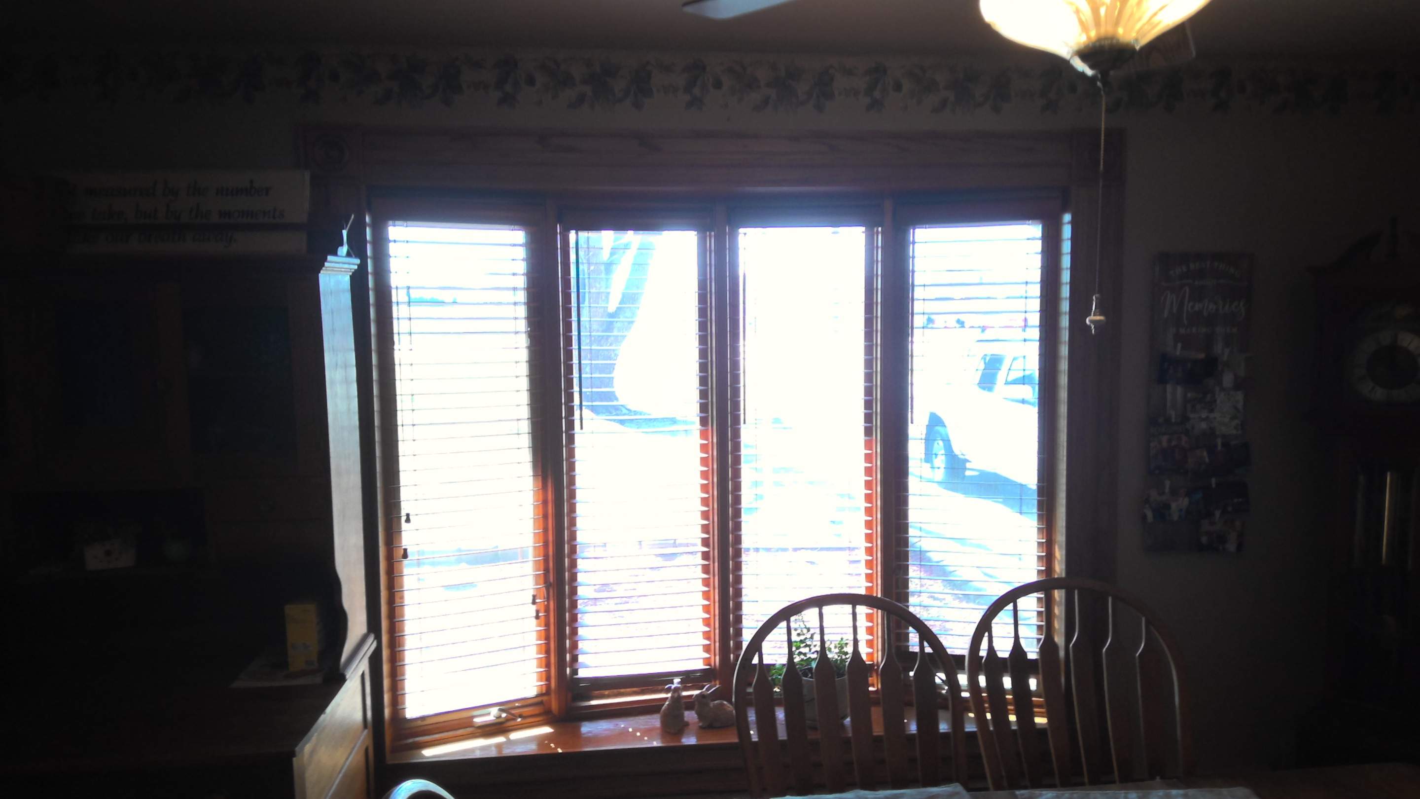 Bow window replacment using Pella Lifestyle wood/Aluminum window by United Windows and Siding LLC