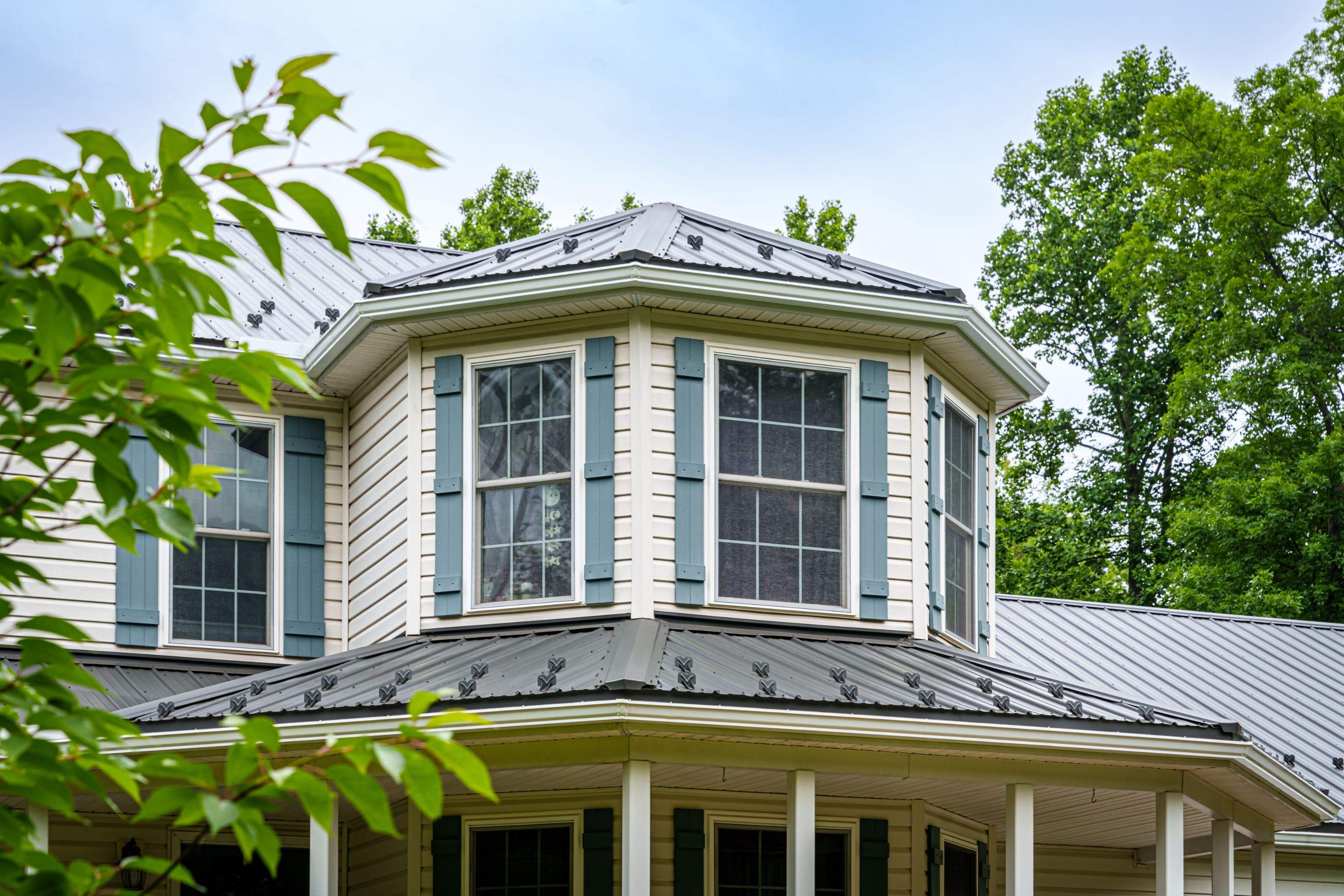 Metal roof install- shadow gray by Esh Builders