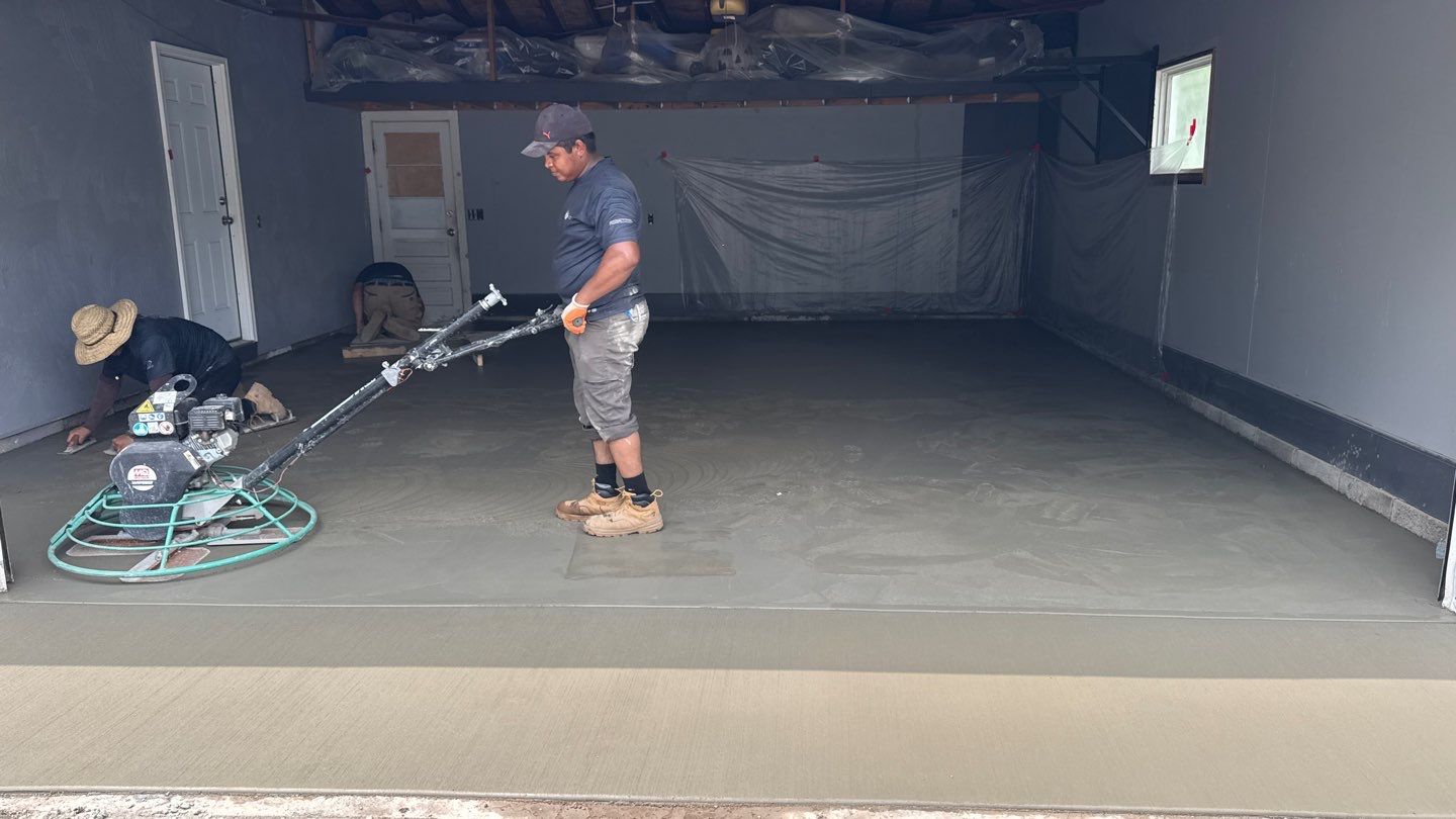 Concrete garage floor replacement and epoxy coating installed  by NG Masonry & Construction LLC