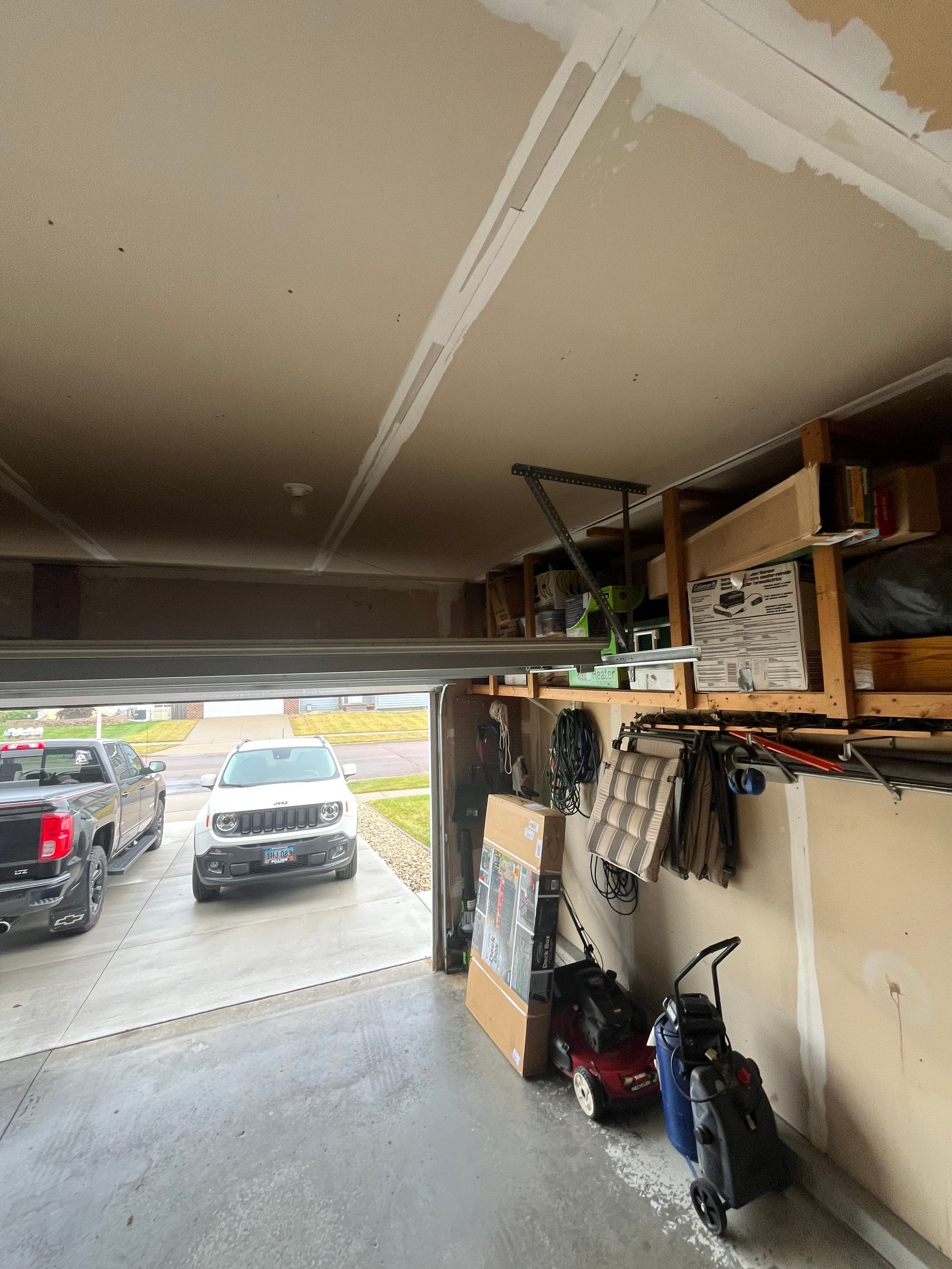 Nightfall Grey Speckled Epoxy Garage Floor Coating in Sioux Falls by Select Painting, Coatings & Garage Cabinets