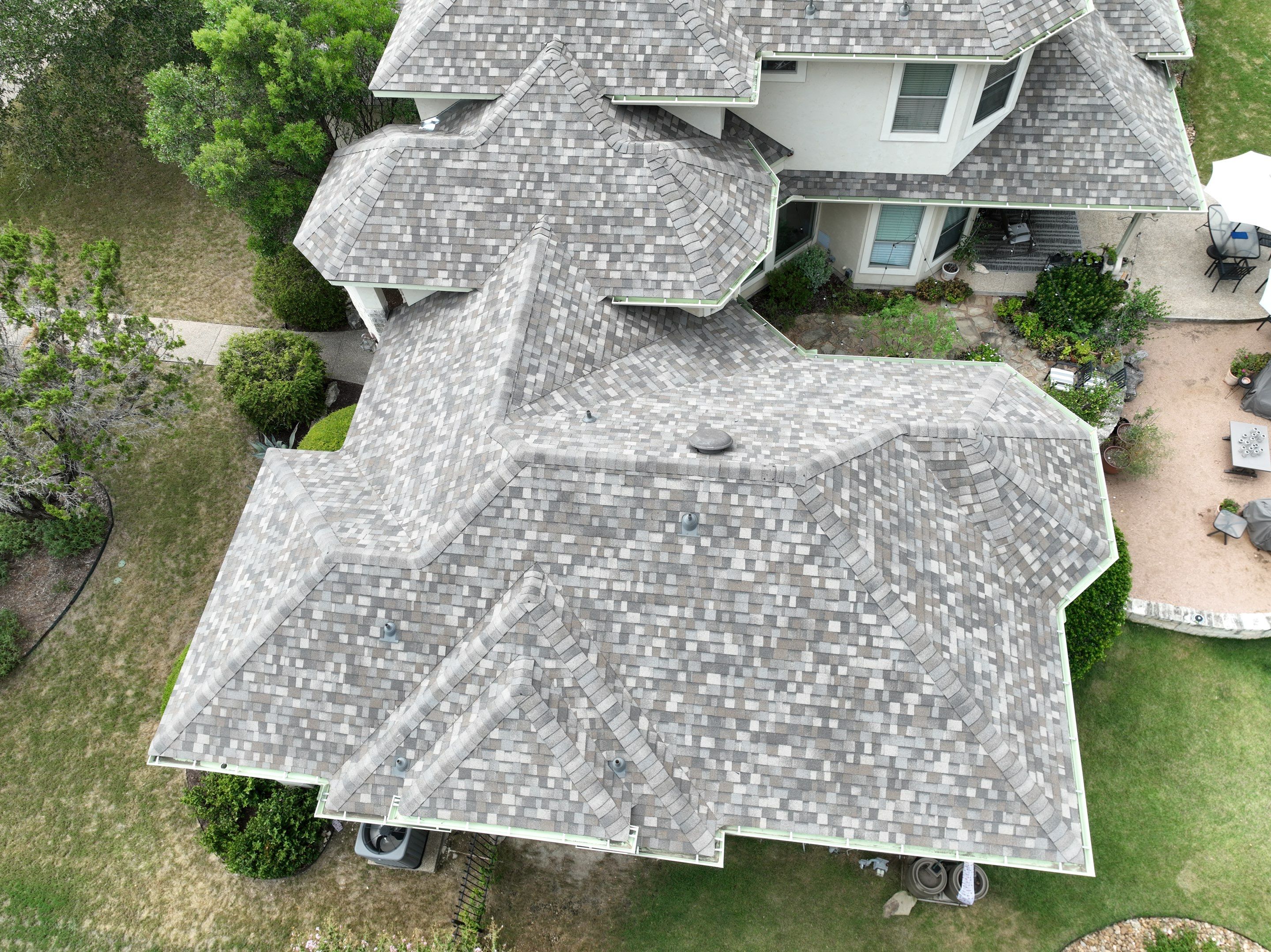 Residential Roof Replacement using 30 Year Laminate Shingles with High Profile Ridge by Premier Roofing and Contracting