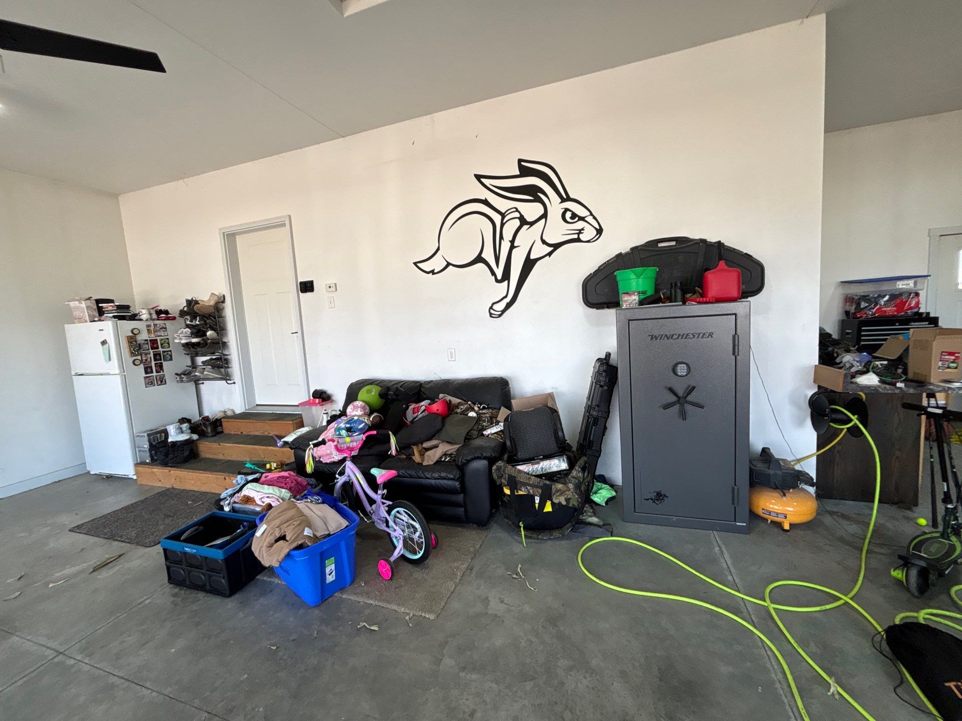 Speckled Polyaspartic Garage Floor Coating Installation in Dell Rapids by Select Painting, Coatings & Garage Cabinets