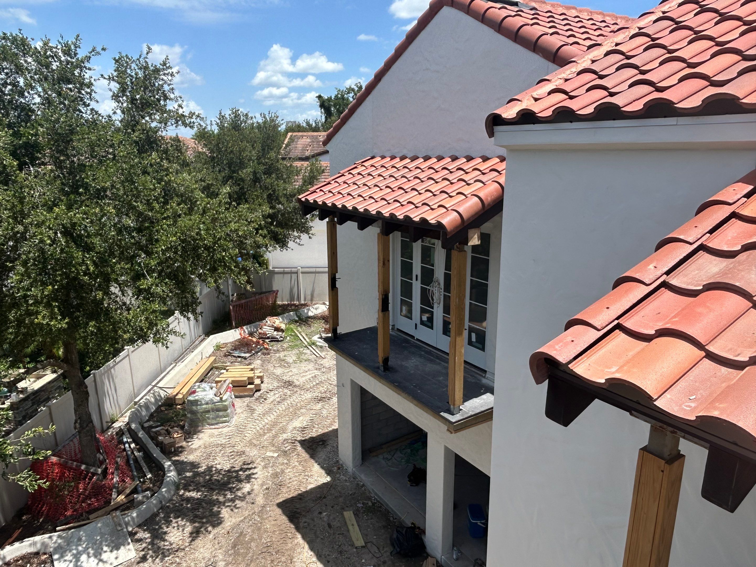 Multi-Story Clay Tile Roof Installation in Winter Park