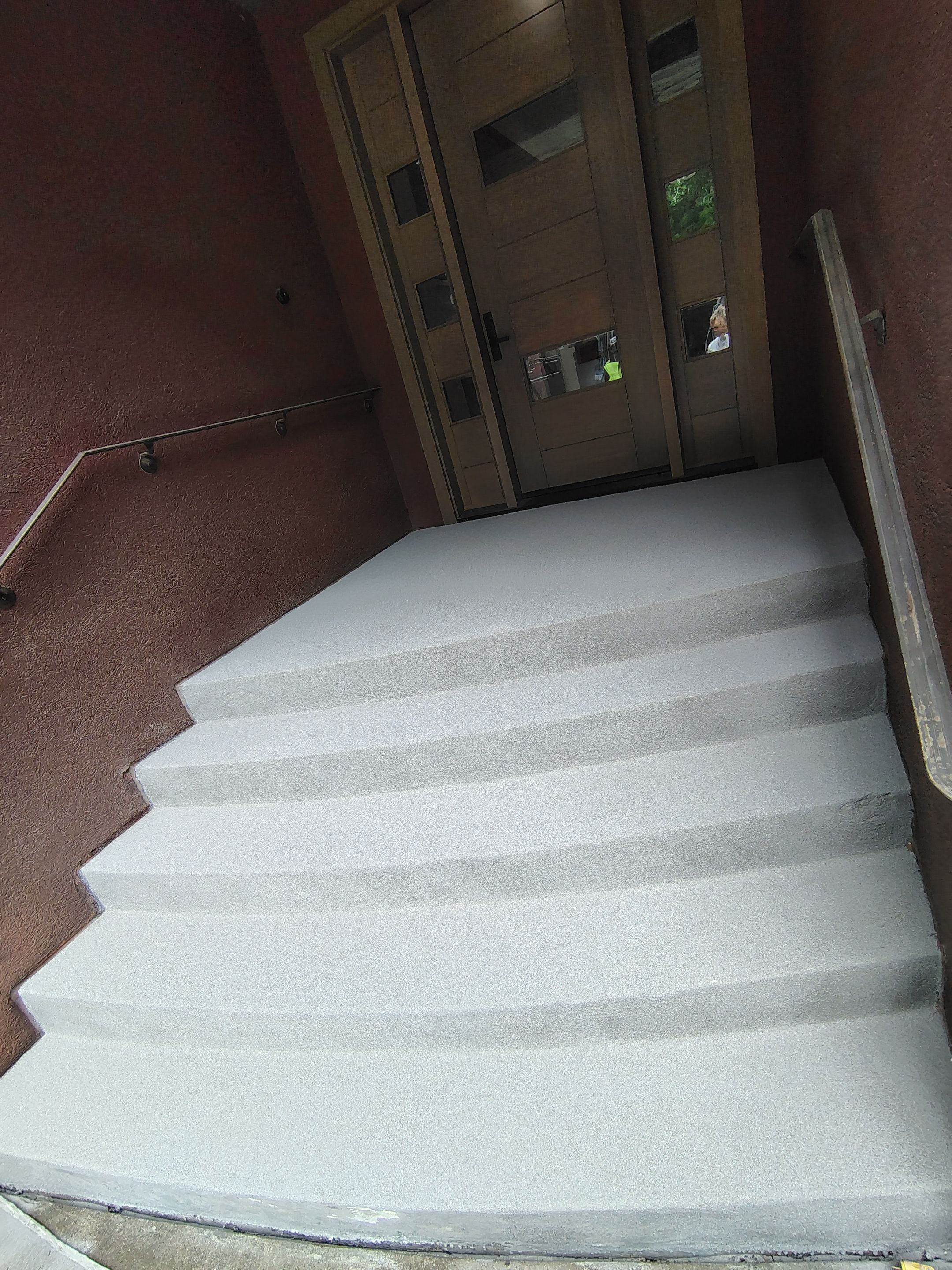 Garage Floor and Entry Step Concrete Coating in Sioux Falls by Select Painting, Coatings & Garage Cabinets