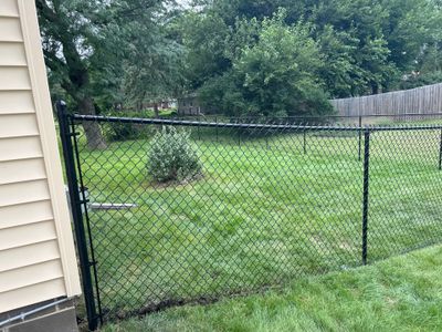 Black Vinyl-Coated Chain Link Fence Installation in Waterloo