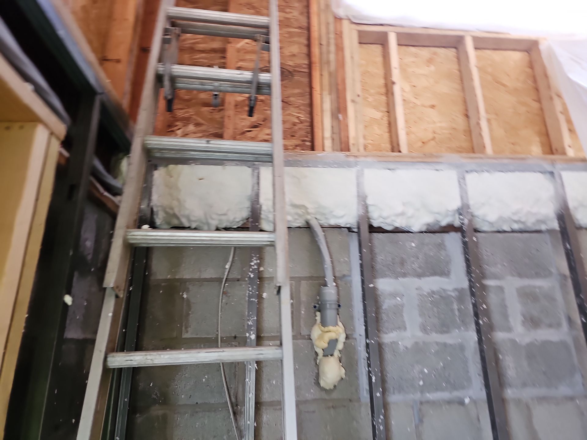 Basement Exterior Walls using Closed Cell Spray Foam by NYS Foam & Energy