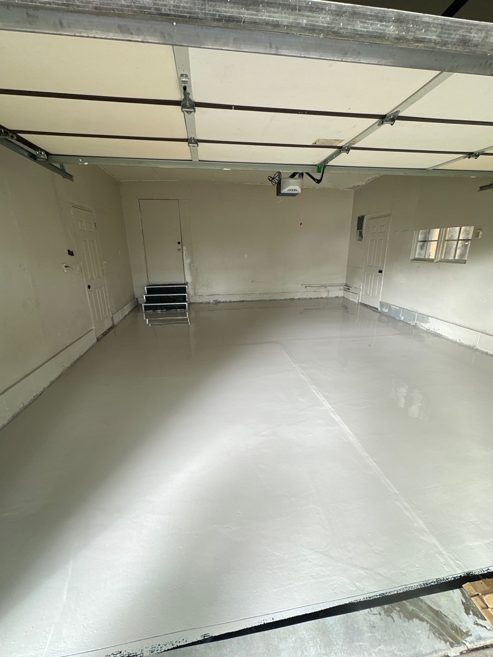High-Gloss Metallic Epoxy Garage Floor Transformation in Lincoln by Goat Coatings