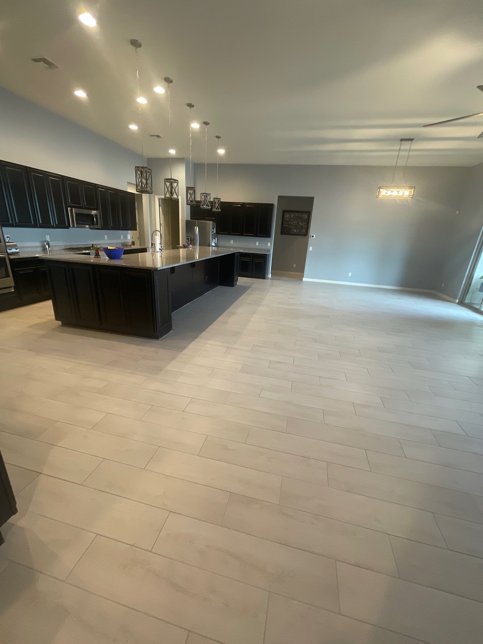 Wood Look Tile Floors and an Extra Large Shower  by Footprints Floors of Chandler 