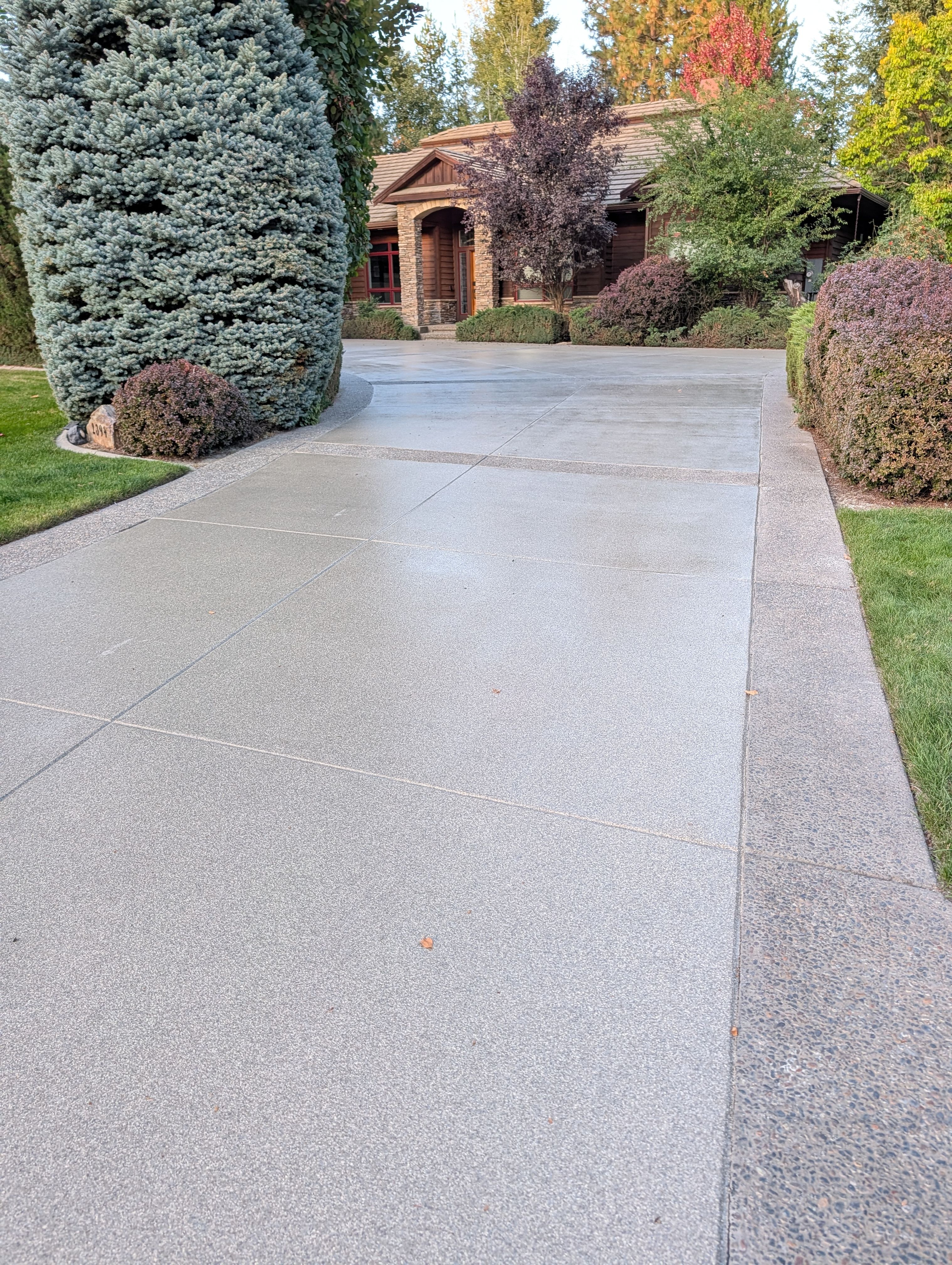 Driveway using Penntek Evolution System and Trail Mix 1/8" Chip by Croc Coatings, LLC