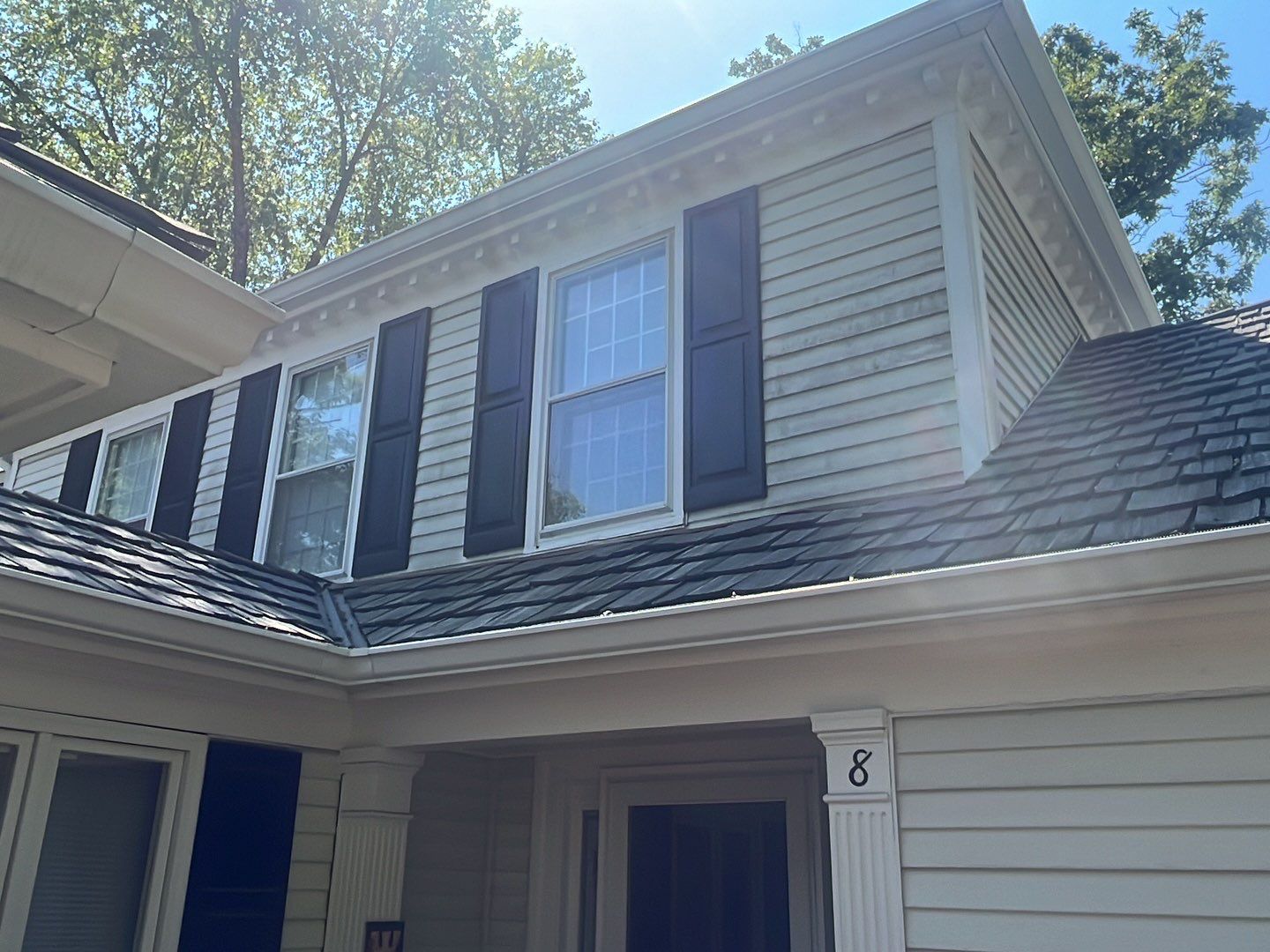 Housewashing  using Algaecide, soft wash soap by Northern Power Washing LLC.