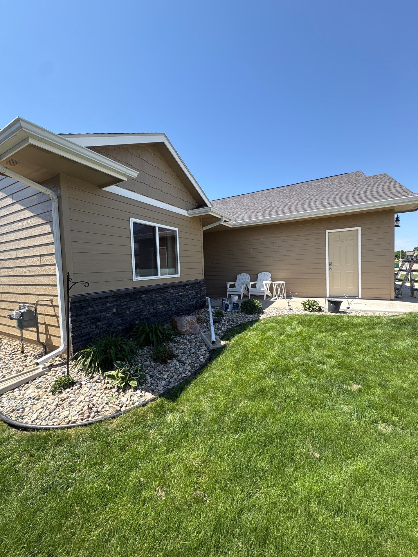 Residential Exterior Painting and Siding Refresh in Sioux Falls by Select Painting, Coatings & Garage Cabinets