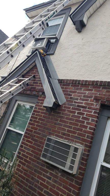 New Roof & Gutters by Island Roofing Inc.