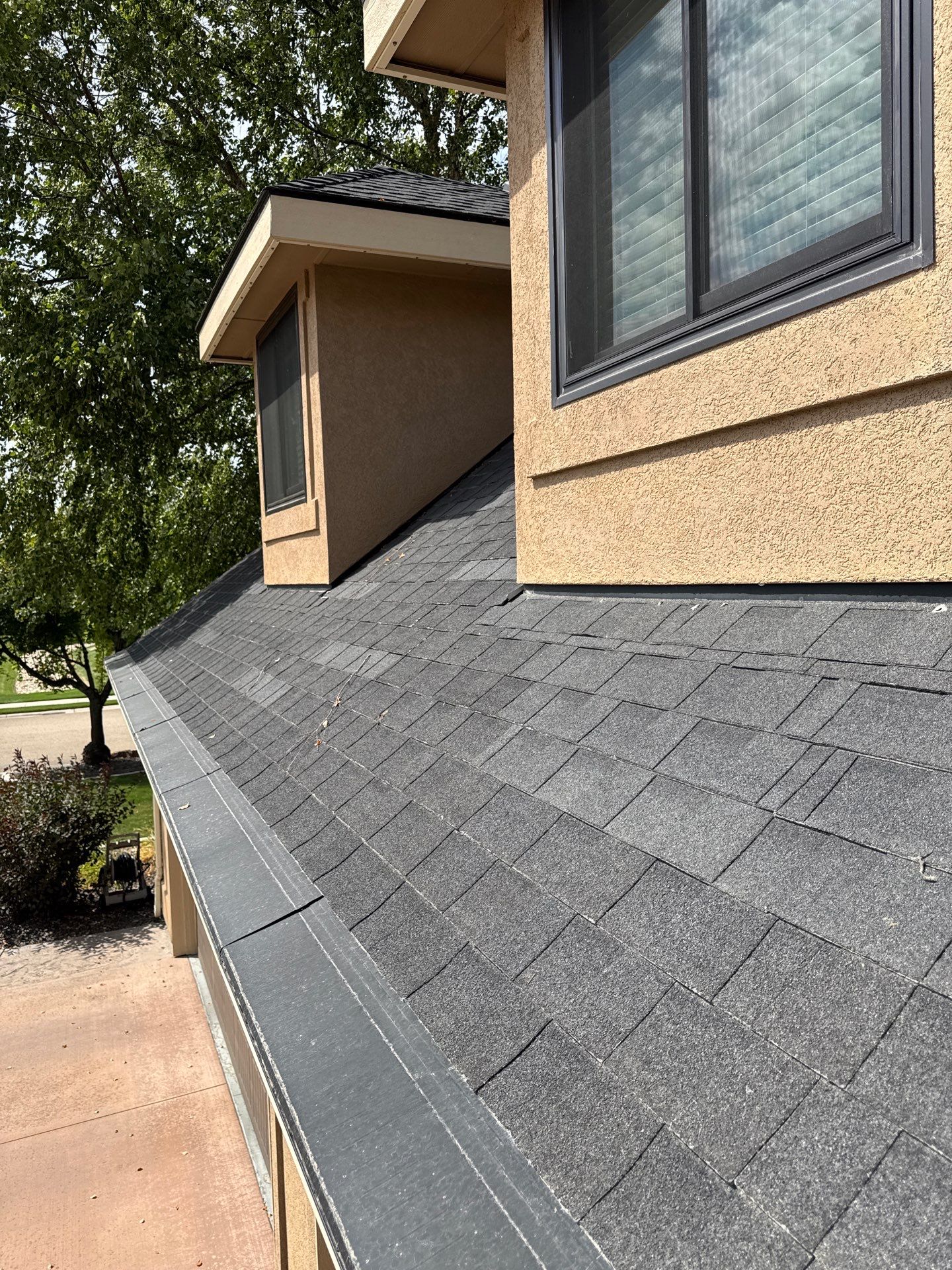 Middleton Residential Roof Replacement with Dark Grey Architectural Shingles by Olive Roofing
