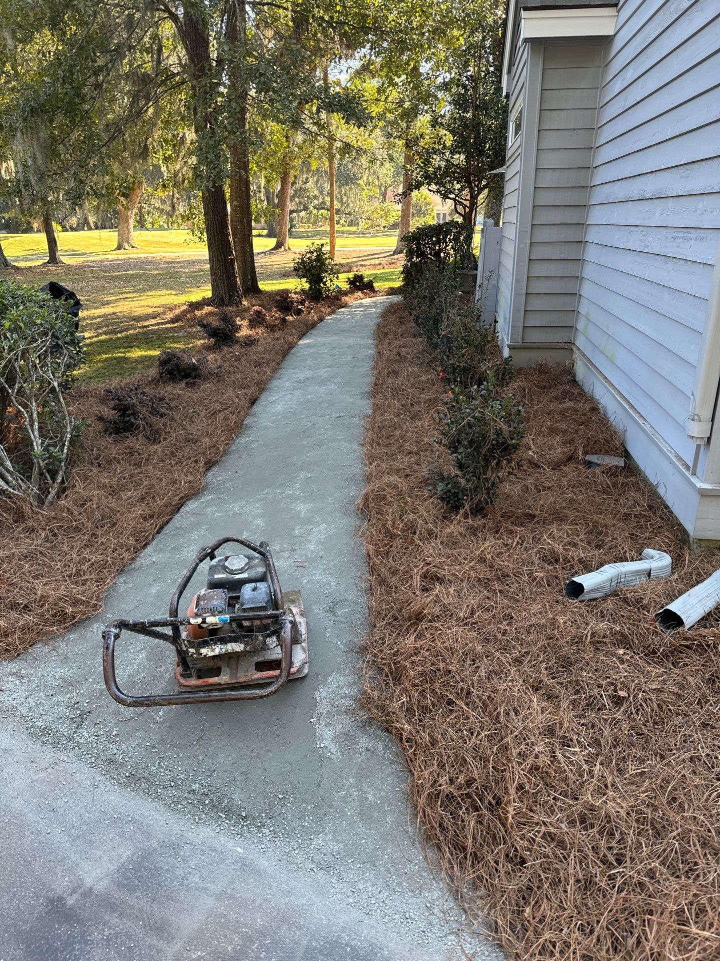 Concrete Walkway Installation and Landscape Refresh in Hilton Head Island by Lowcountry Scapes, LLC