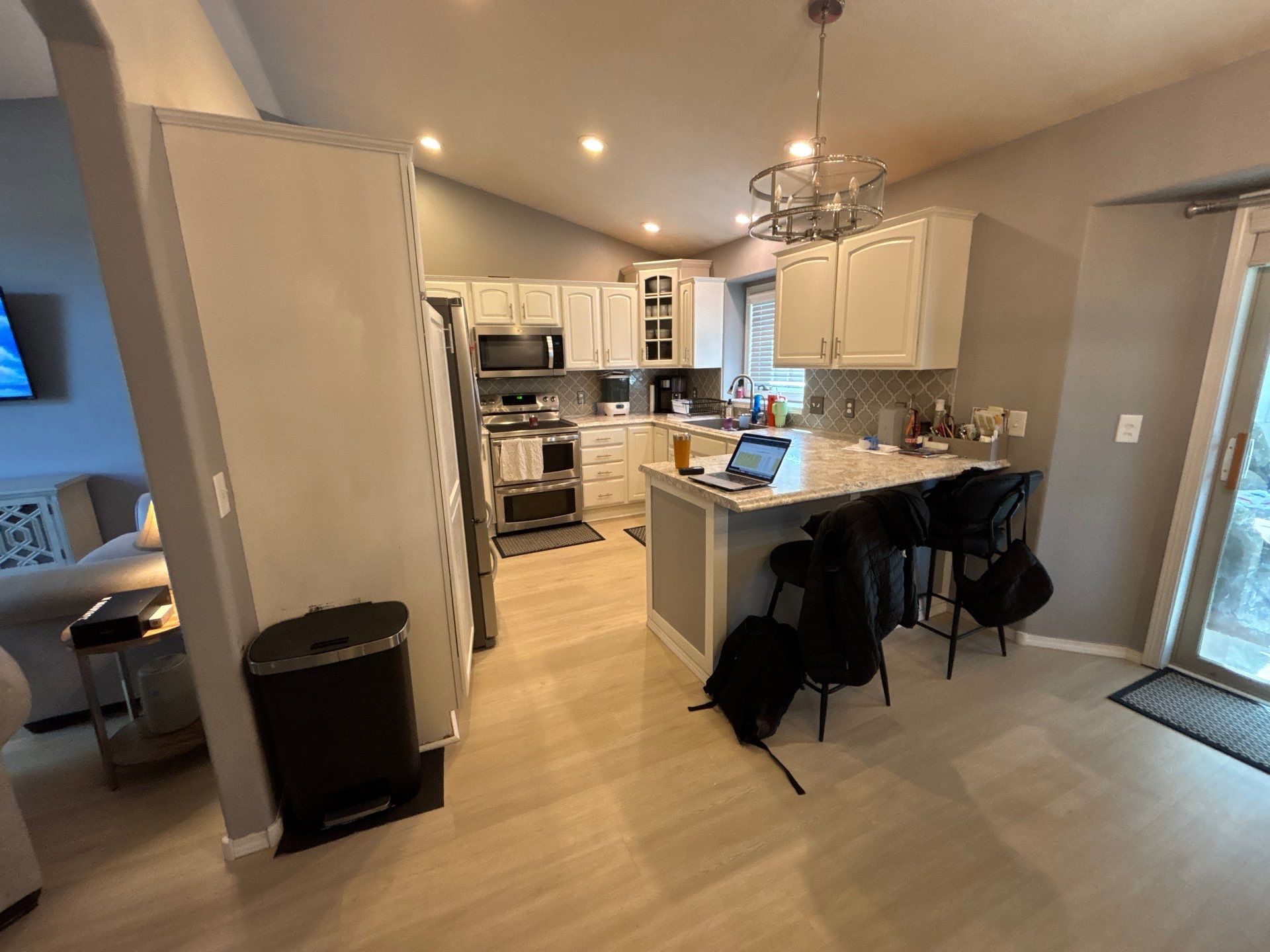 Sioux Falls Interior Painting and Luxury Vinyl Plank Flooring Installation by Select Painting, Coatings & Garage Cabinets