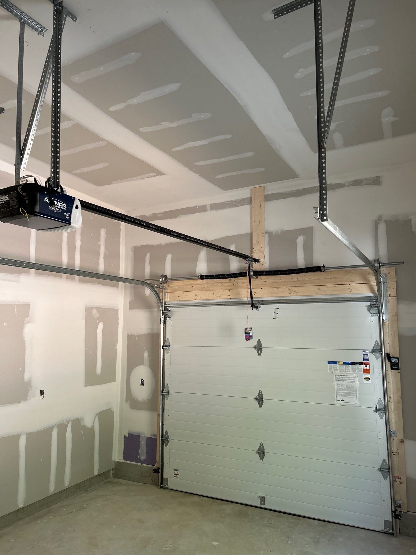 Installation of a Clopay Modern Steel Garage doors by Keene Door