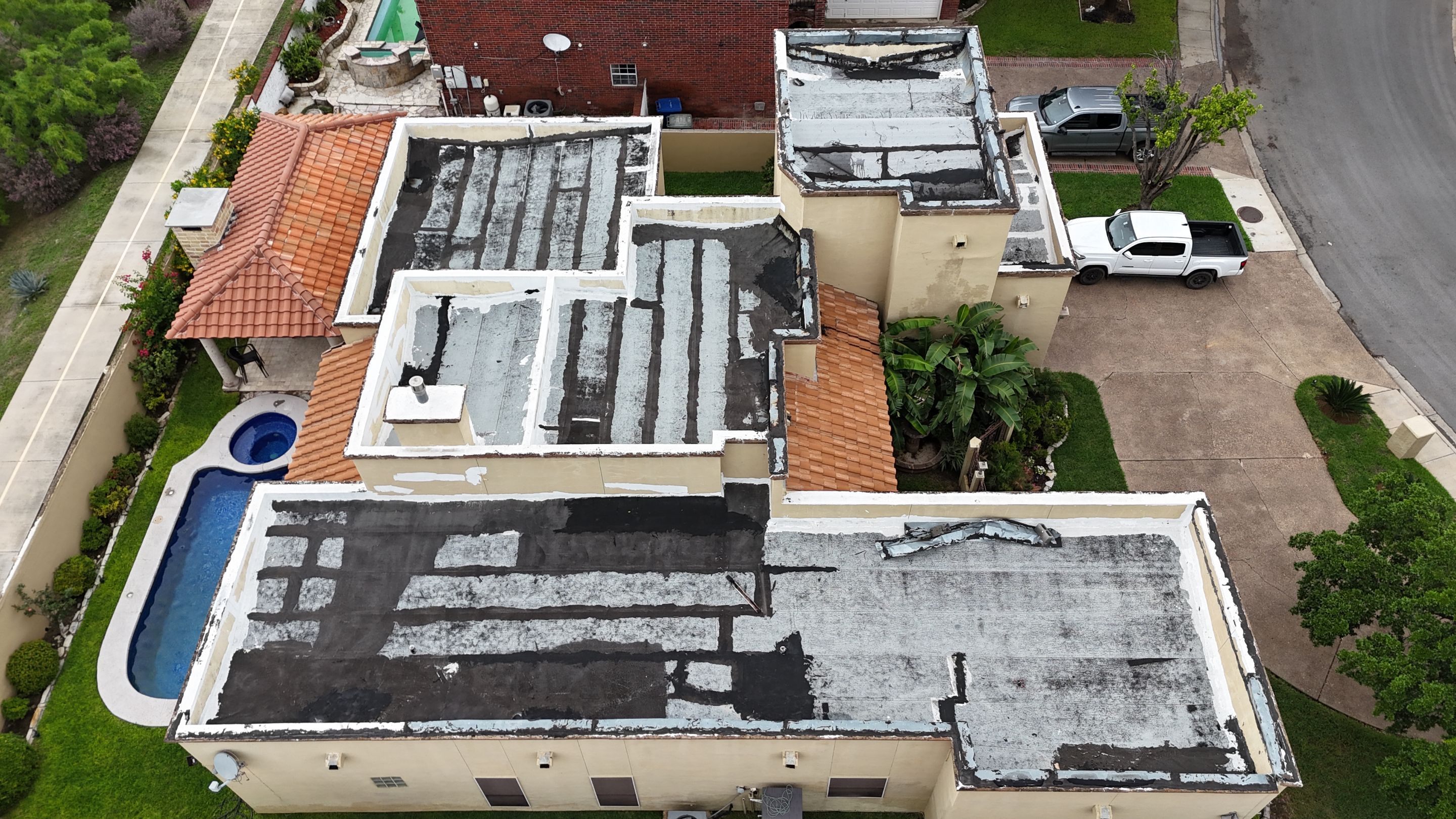 Flat Roof Replacement by JM Flores Roofing & Construction, Inc