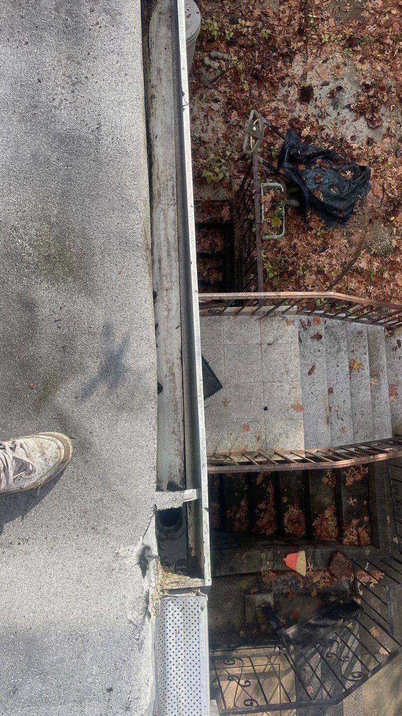 Flat Roof Cleanup and gutter cleaning.  by Above All Gutters 