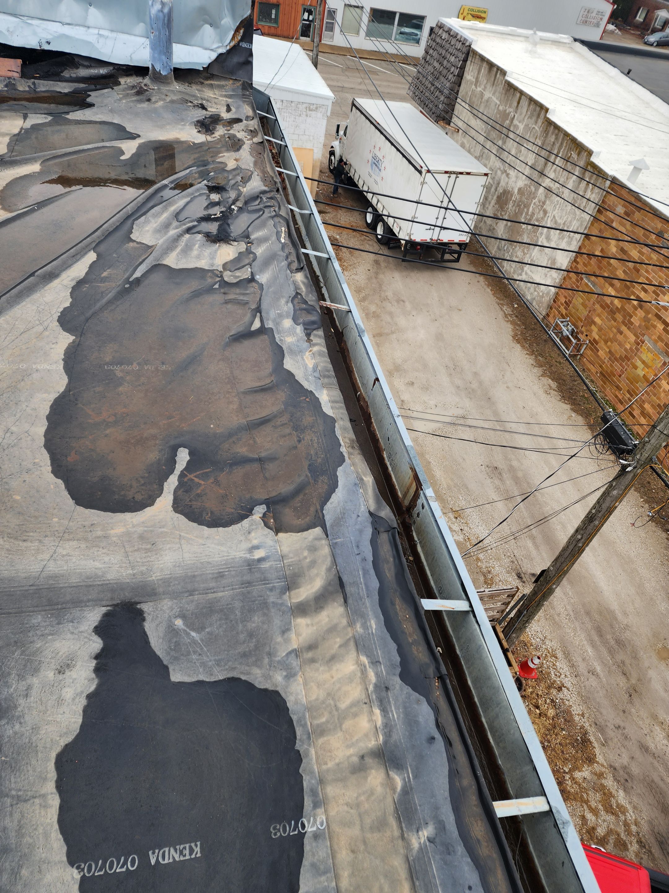 Roof Recover on a downtown building in Lake City  by Grell Roofing, LLC