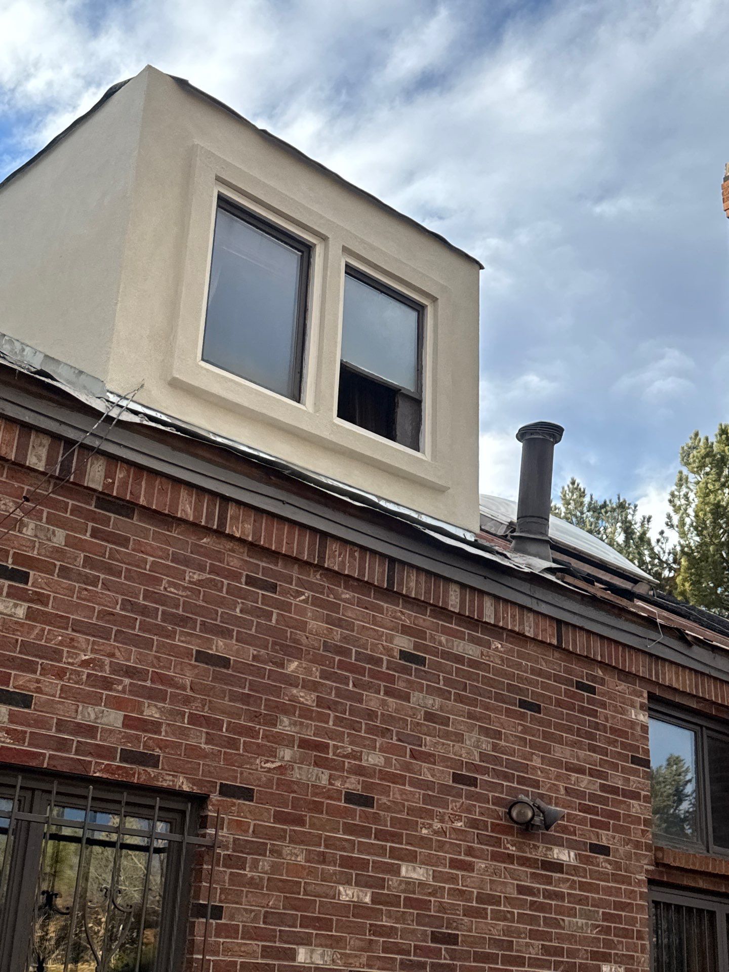 Unified Stone Coated Roof & Stucco Remodle by Blue Peaks Roofing LLC