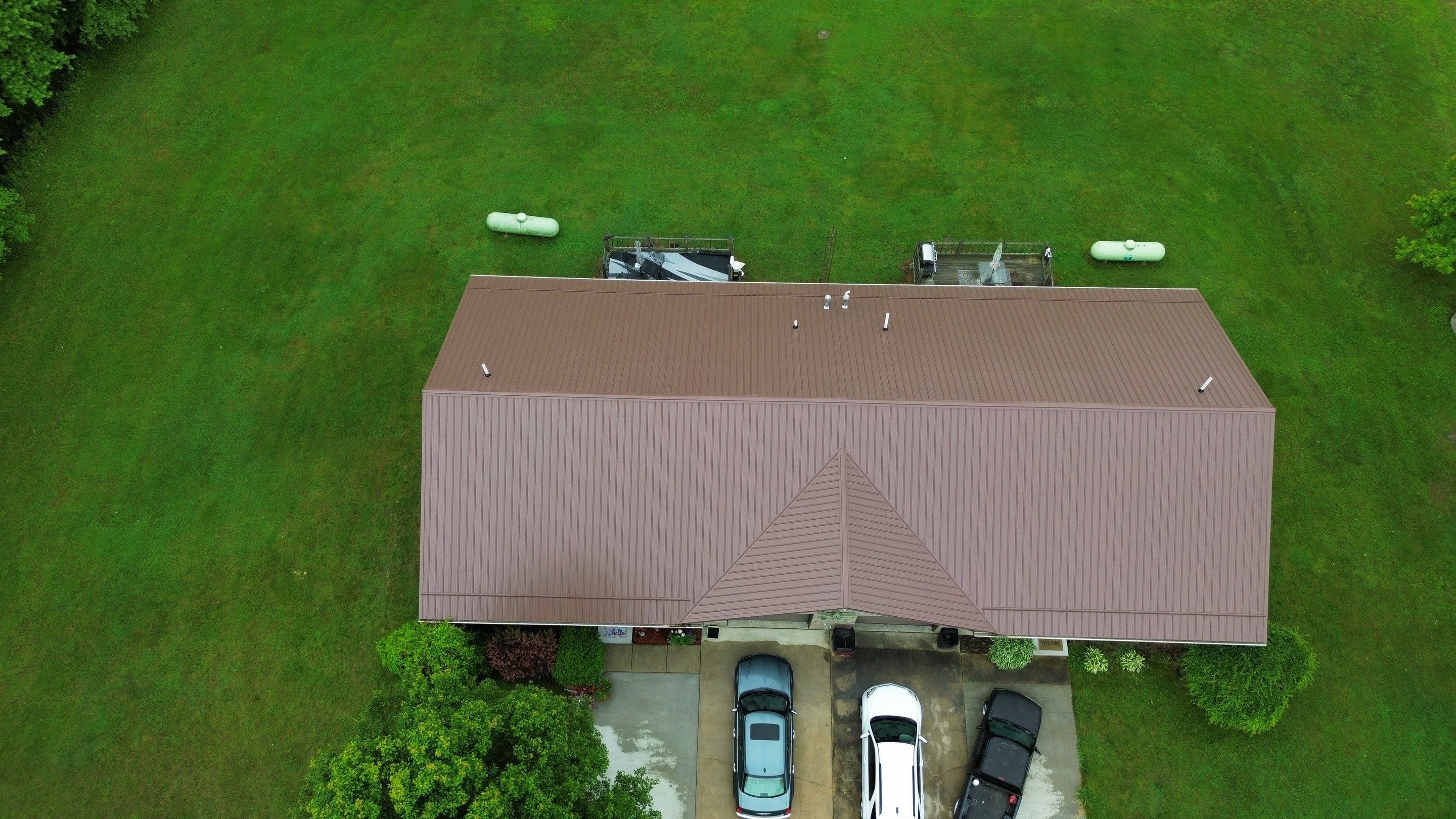 Residential Roofing Installation using Performance Panel Metal - Coca Brown by RoofX 