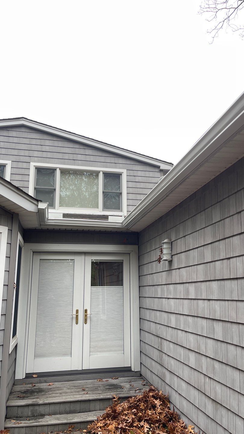 Gutter Installation using 5"white K style seamless gutters and 2x3 white leaders, and Microguard gutter shields installed.  by Above All Gutters 