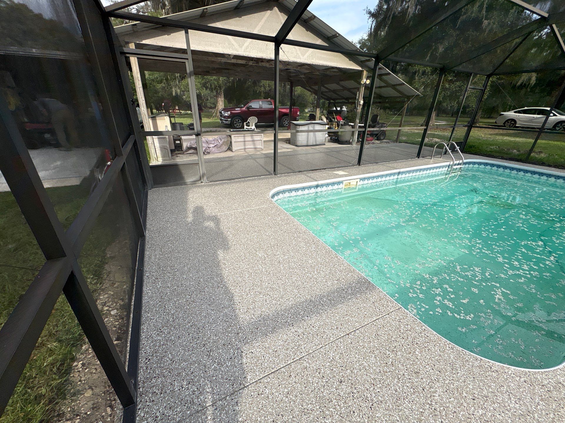 Pool Deck and Driveway in Pebble Beach by Cross Creek Concrete Coatings