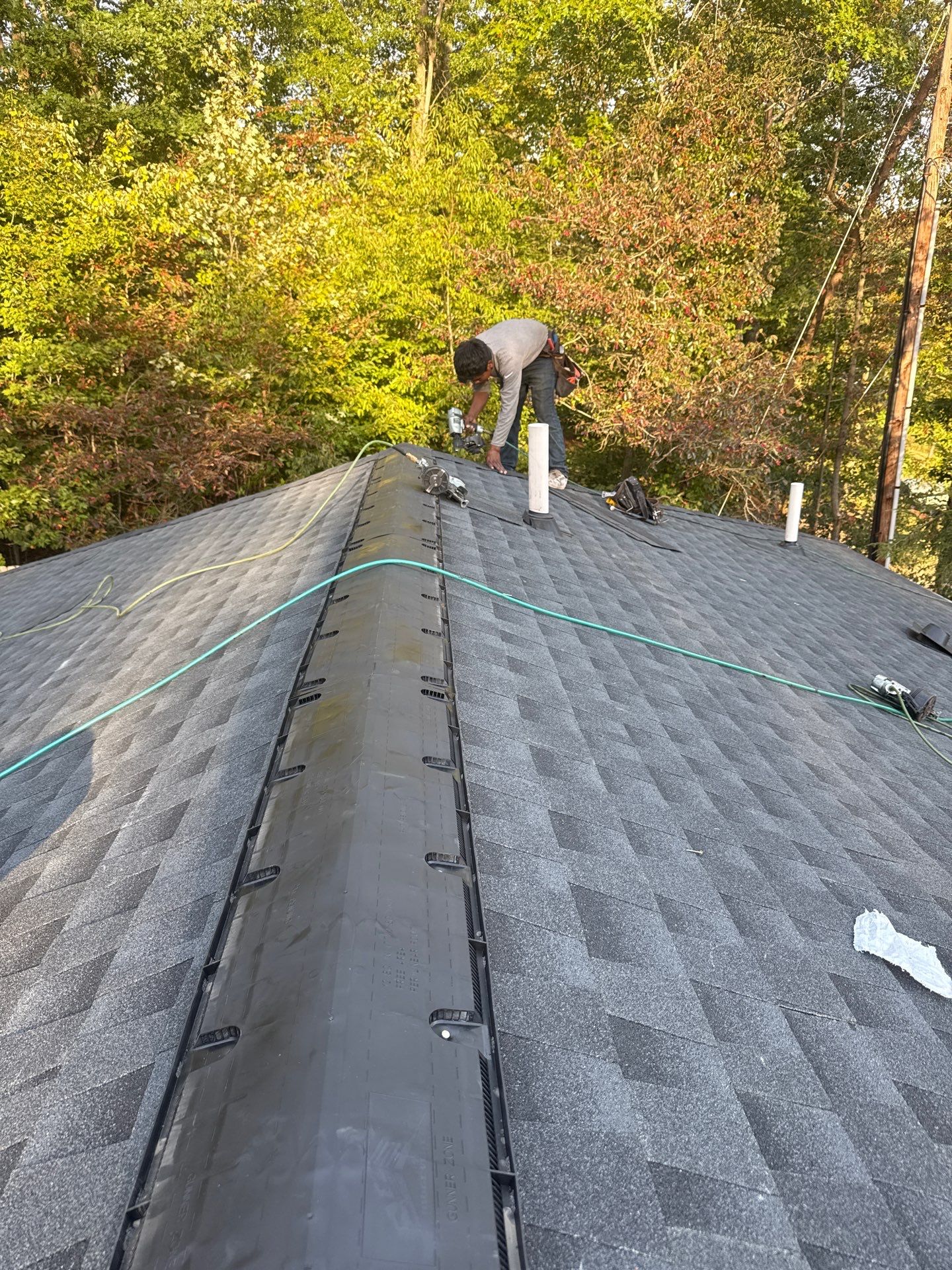 Residential Roofing Installation using GAF Timberline HDZ Charcoal by Rainstoppers Roofing